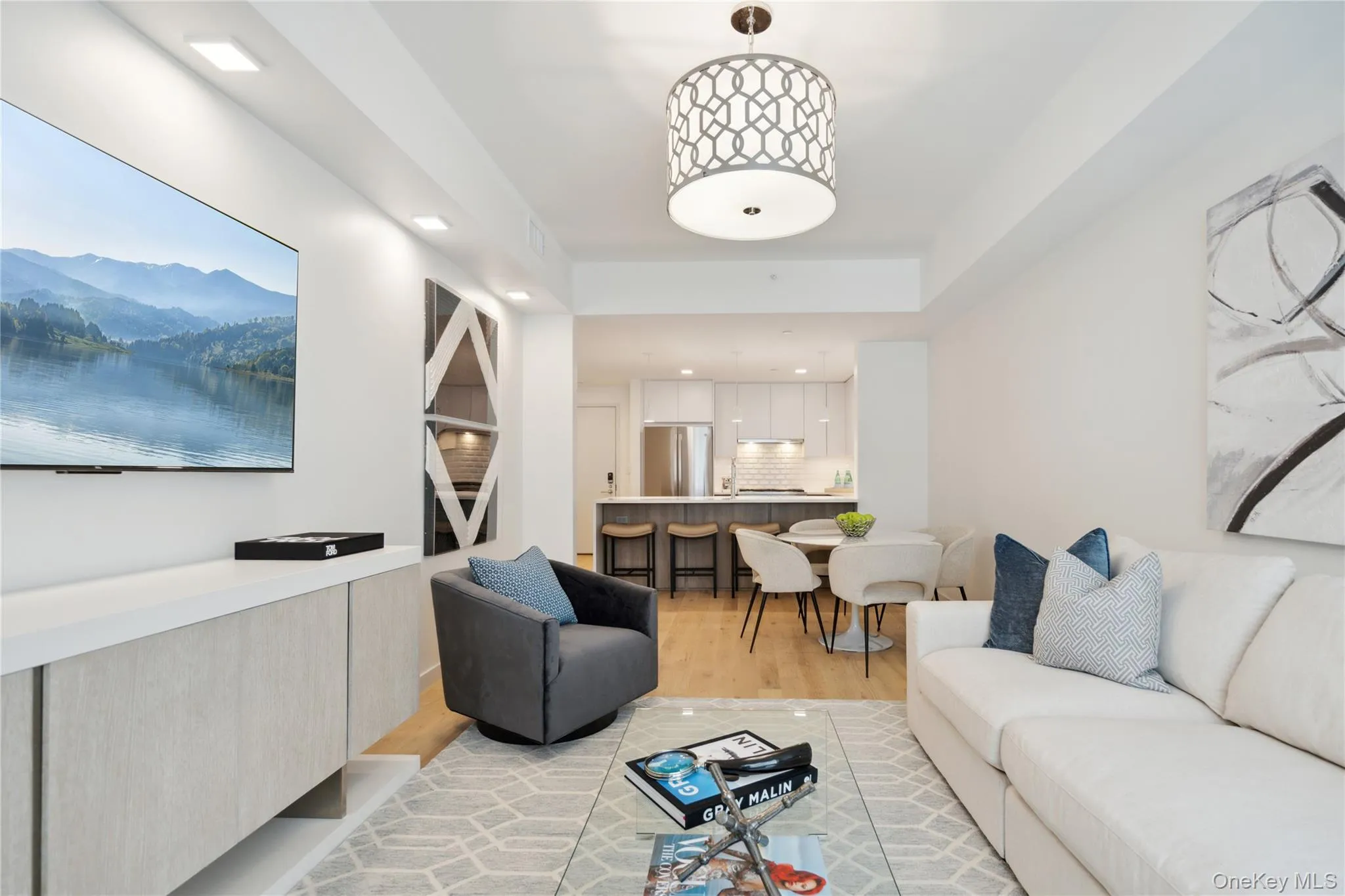 Living room with light hardwood / wood-style floors Living room with light hardwood / wood-style floors