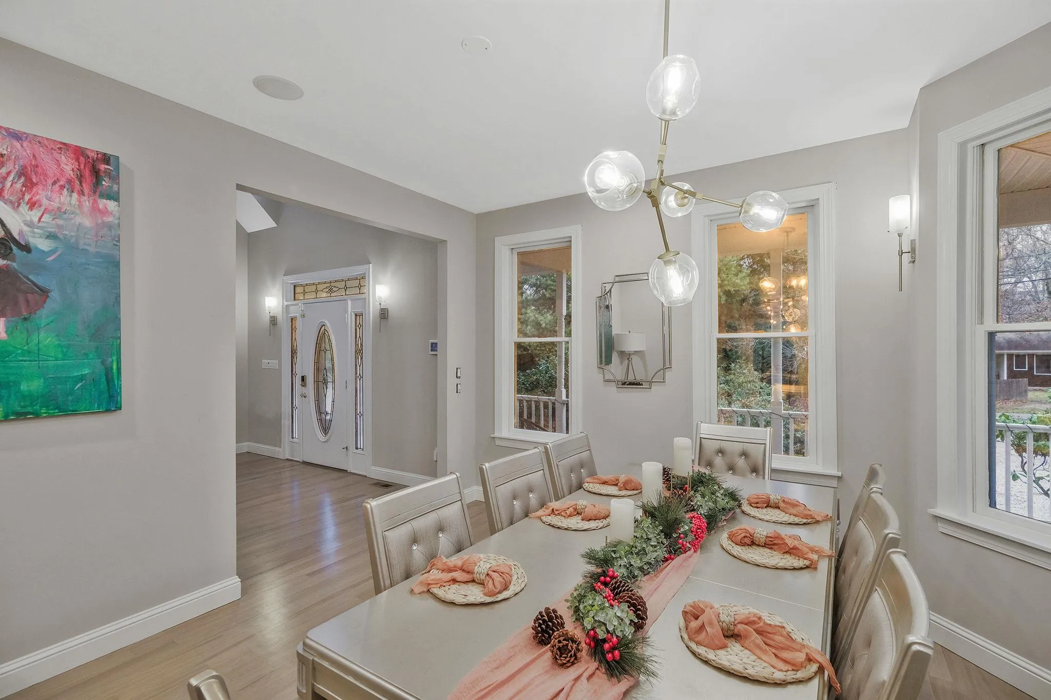 Dining room with plenty of natural light and light hardwood / wood-style flooring Dining room with plenty of natural light and light hardwood / wood-style flooring