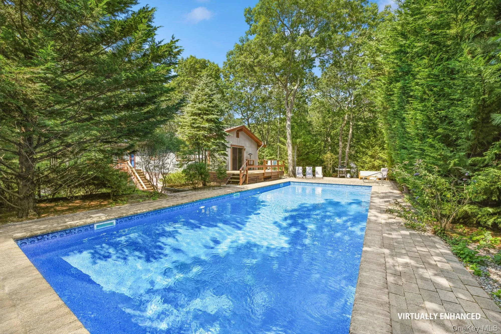 Virtually Enhanced. View Of Heated Pool With Back Deck