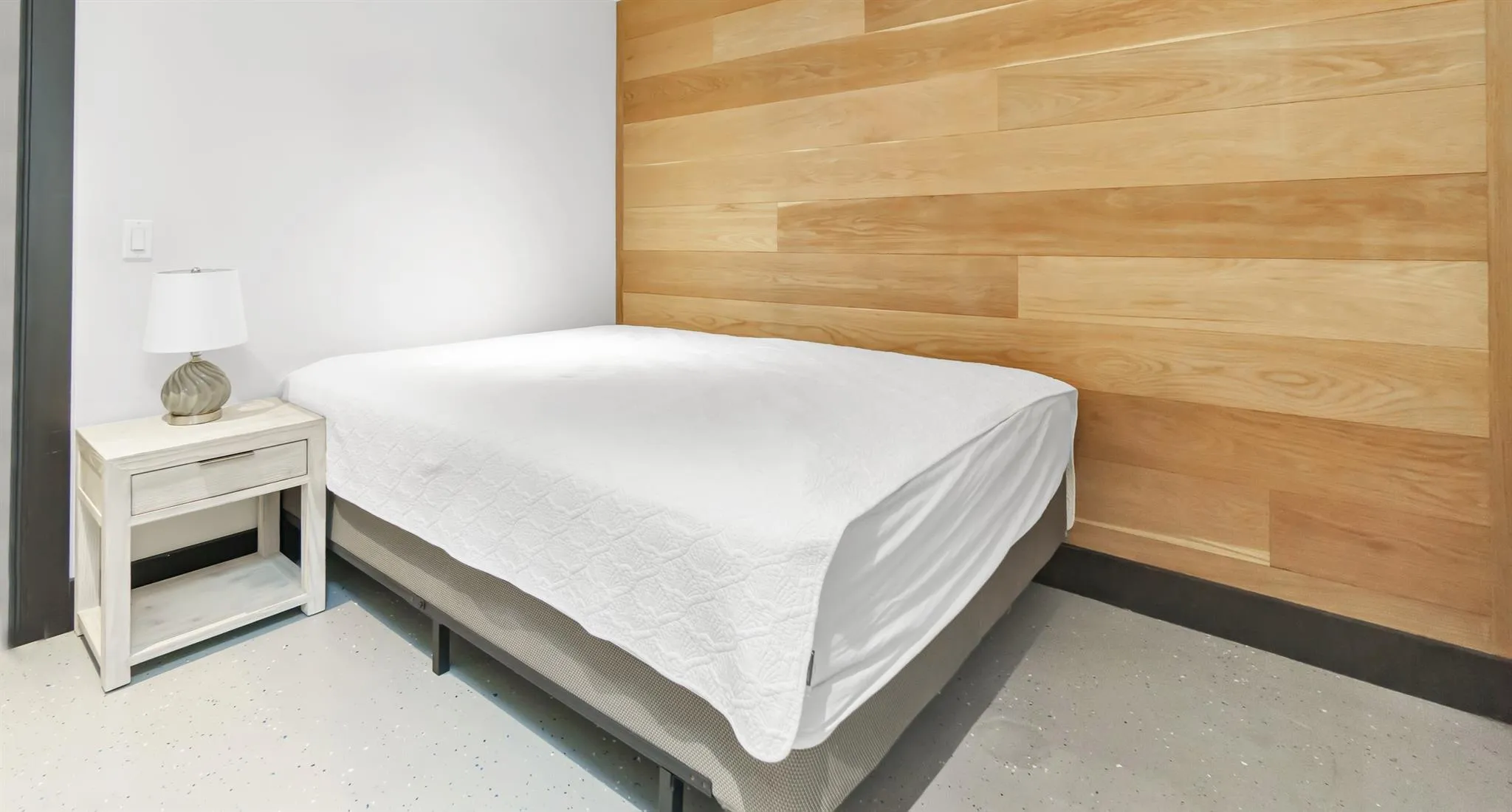 Bedroom with wooden walls Bedroom with wooden walls