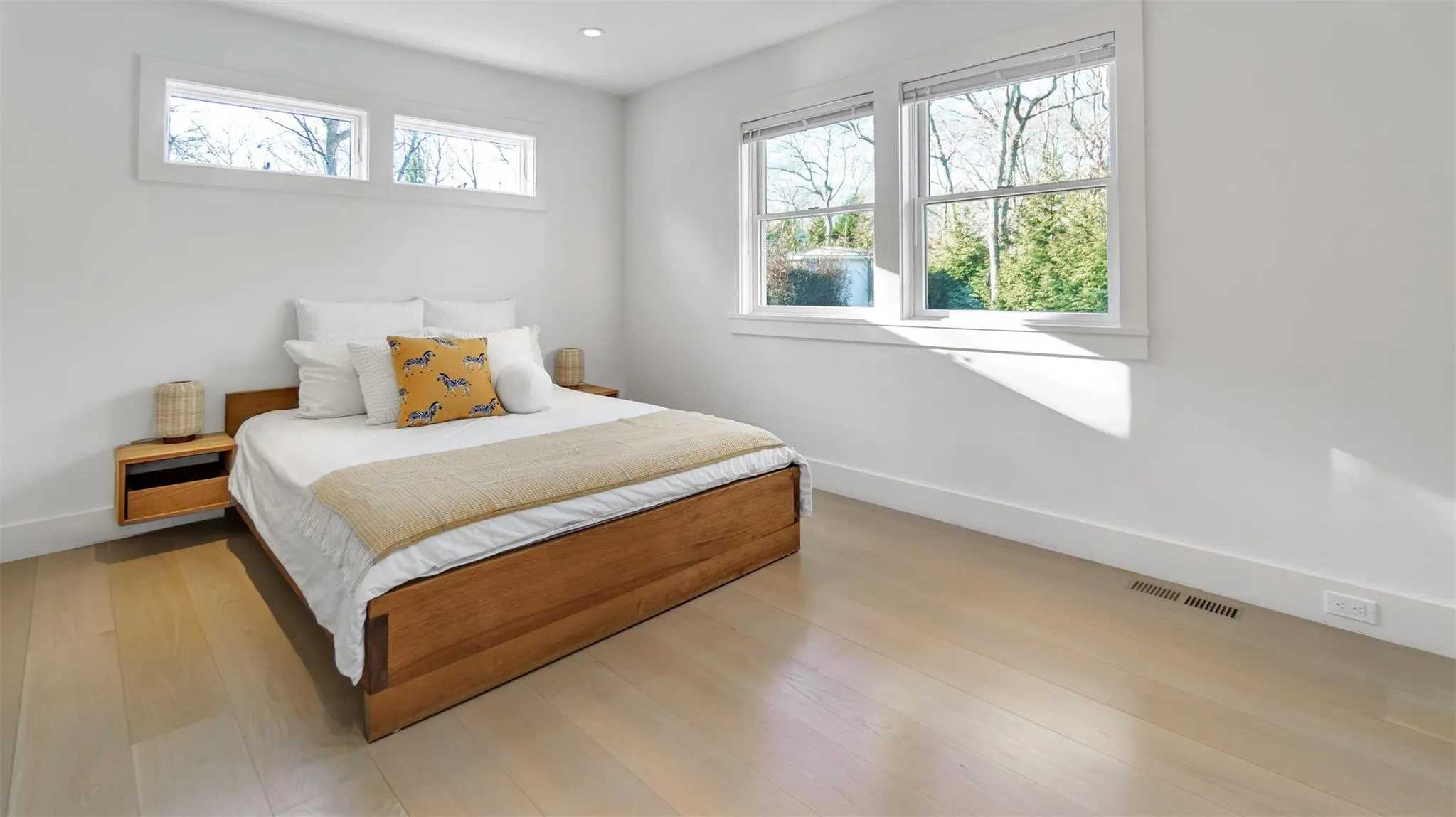 Bedroom with light hardwood / wood-style flooring Bedroom with light hardwood / wood-style flooring