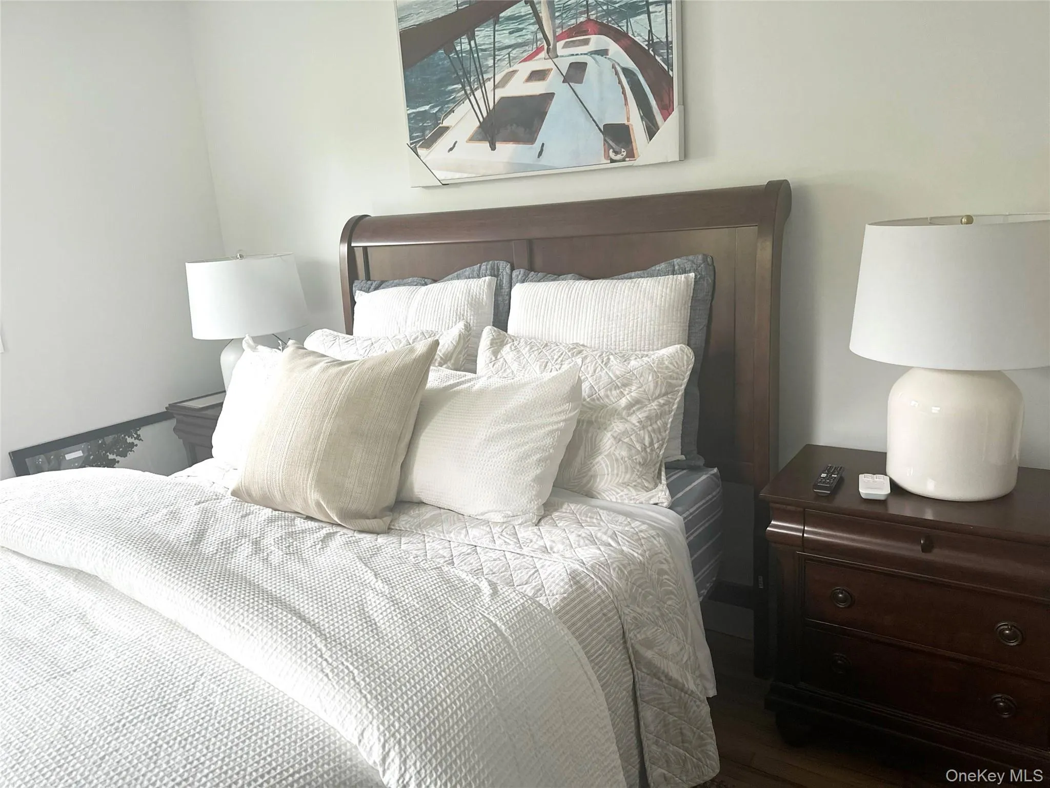 Bedroom featuring hardwood / wood-style flooring Bedroom featuring hardwood / wood-style flooring