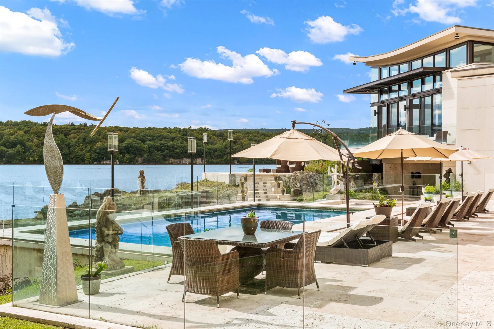 View of pool featuring a patio View of pool featuring a patio