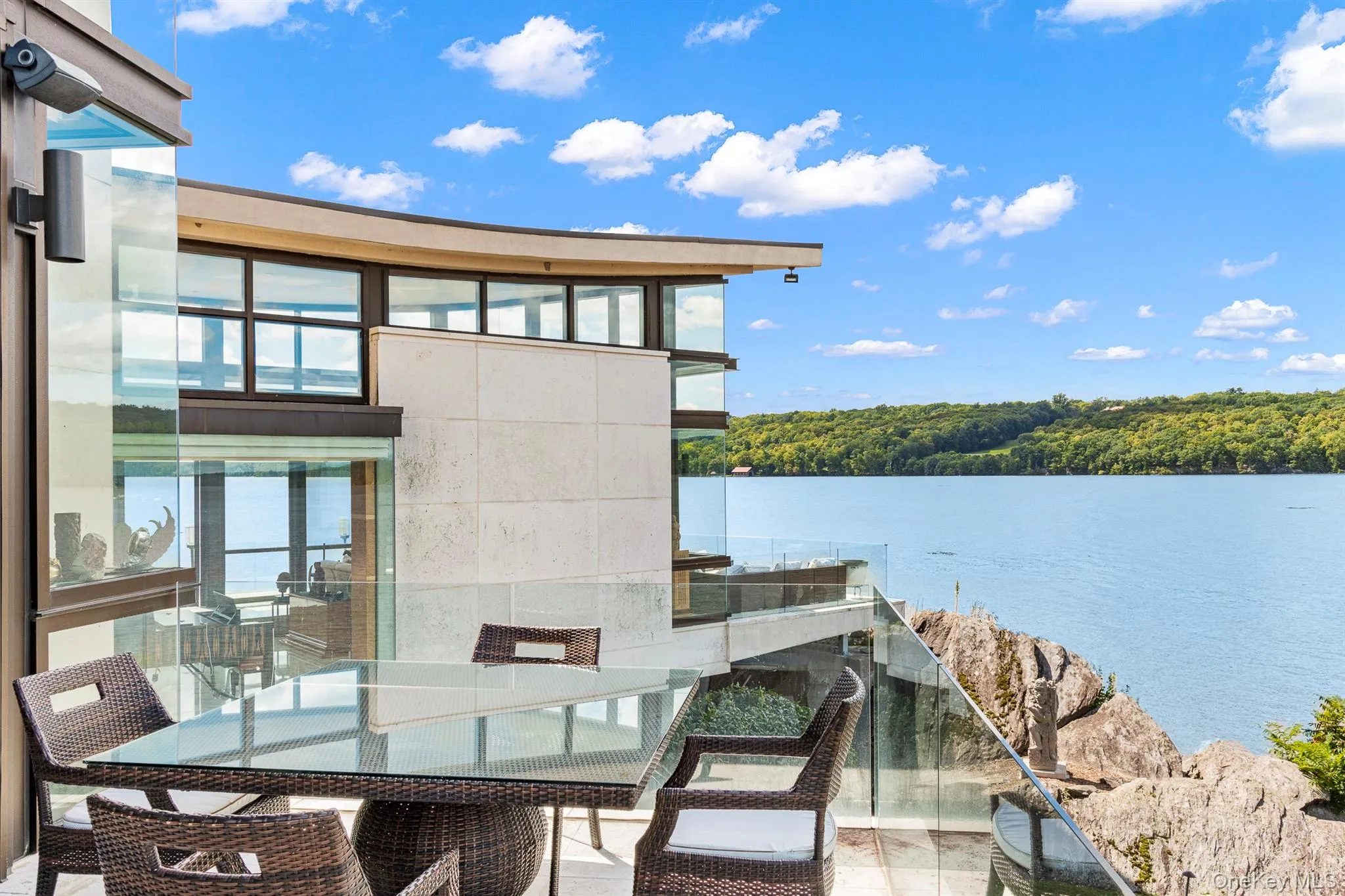 View of patio / terrace featuring a water view View of patio / terrace featuring a water view