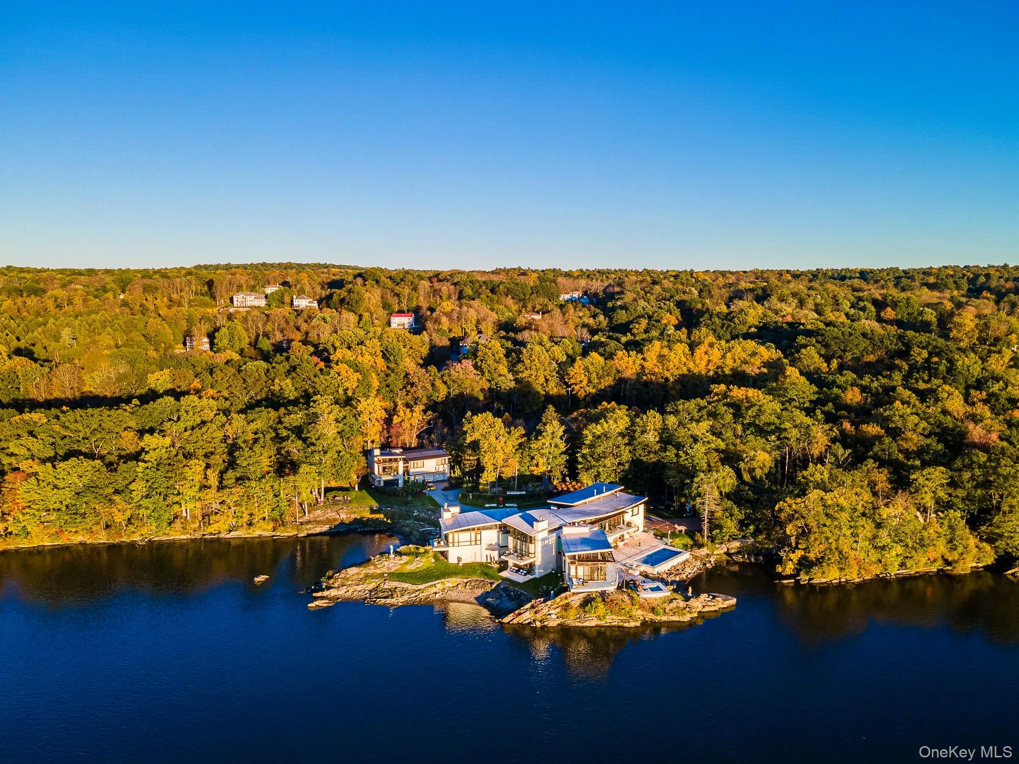 Aerial view featuring a water view Aerial view featuring a water view