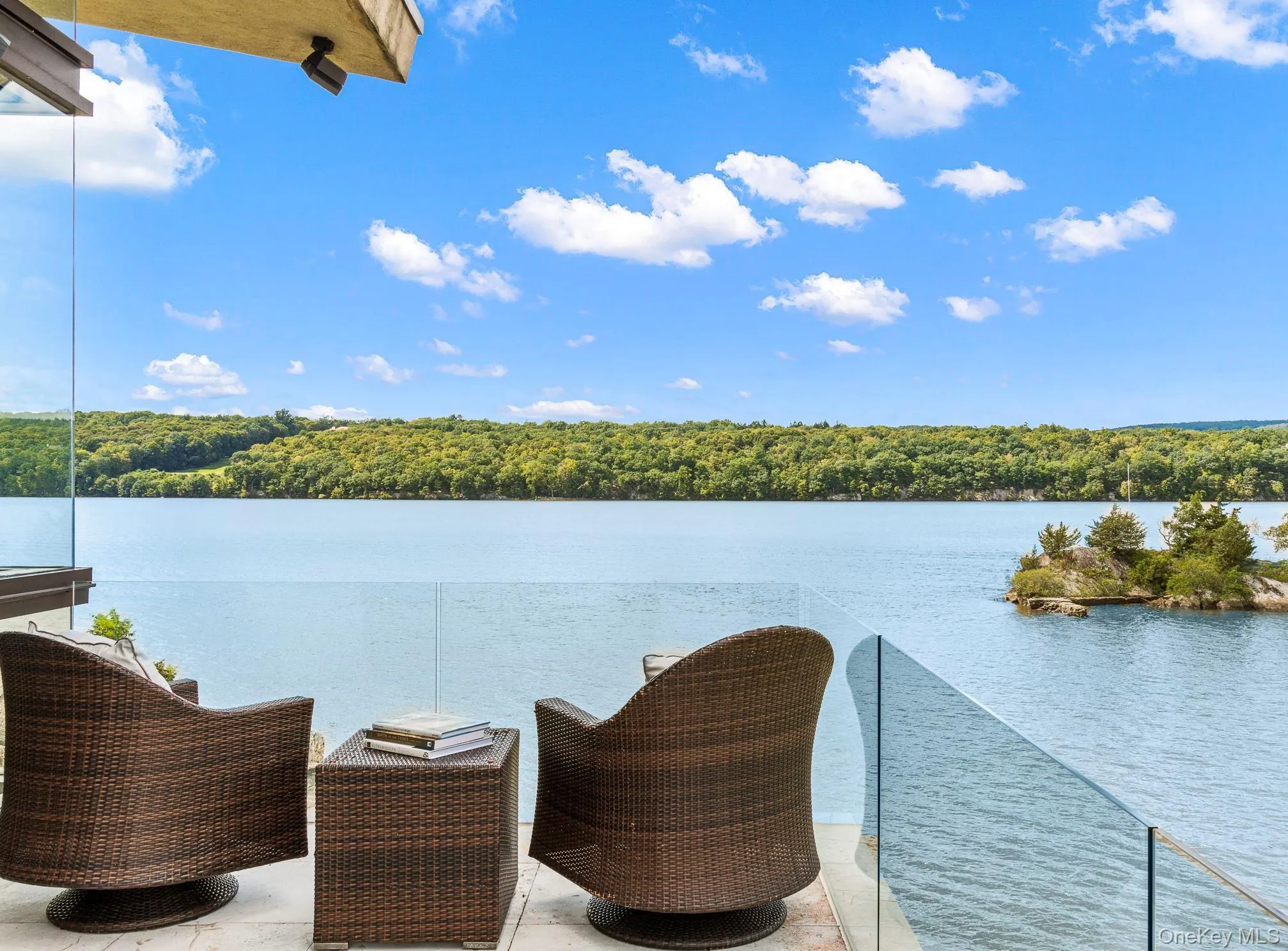 View of patio with a water view View of patio with a water view