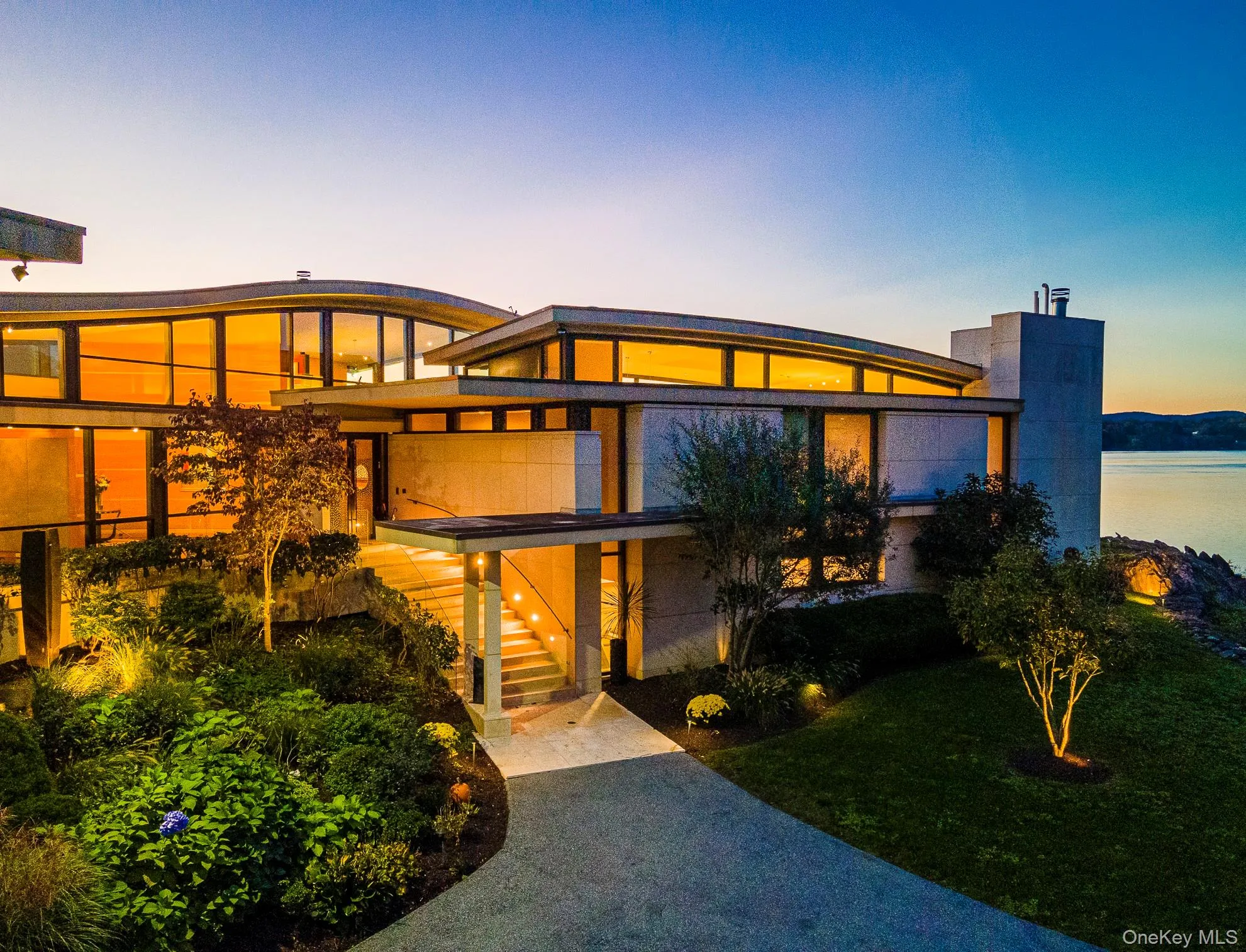 View of front of house with a water view View of front of house with a water view