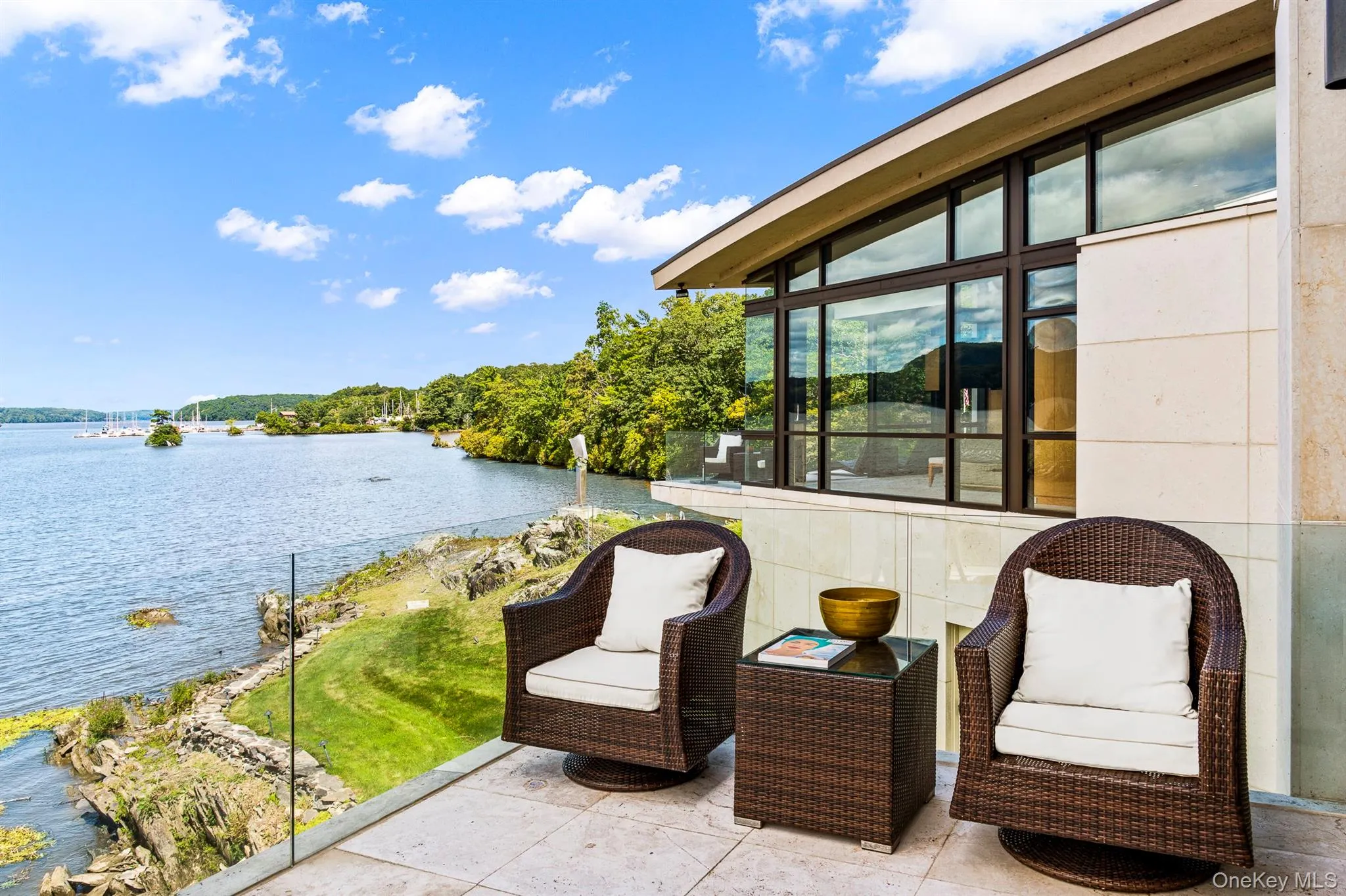 View of patio / terrace featuring a water view View of patio / terrace featuring a water view