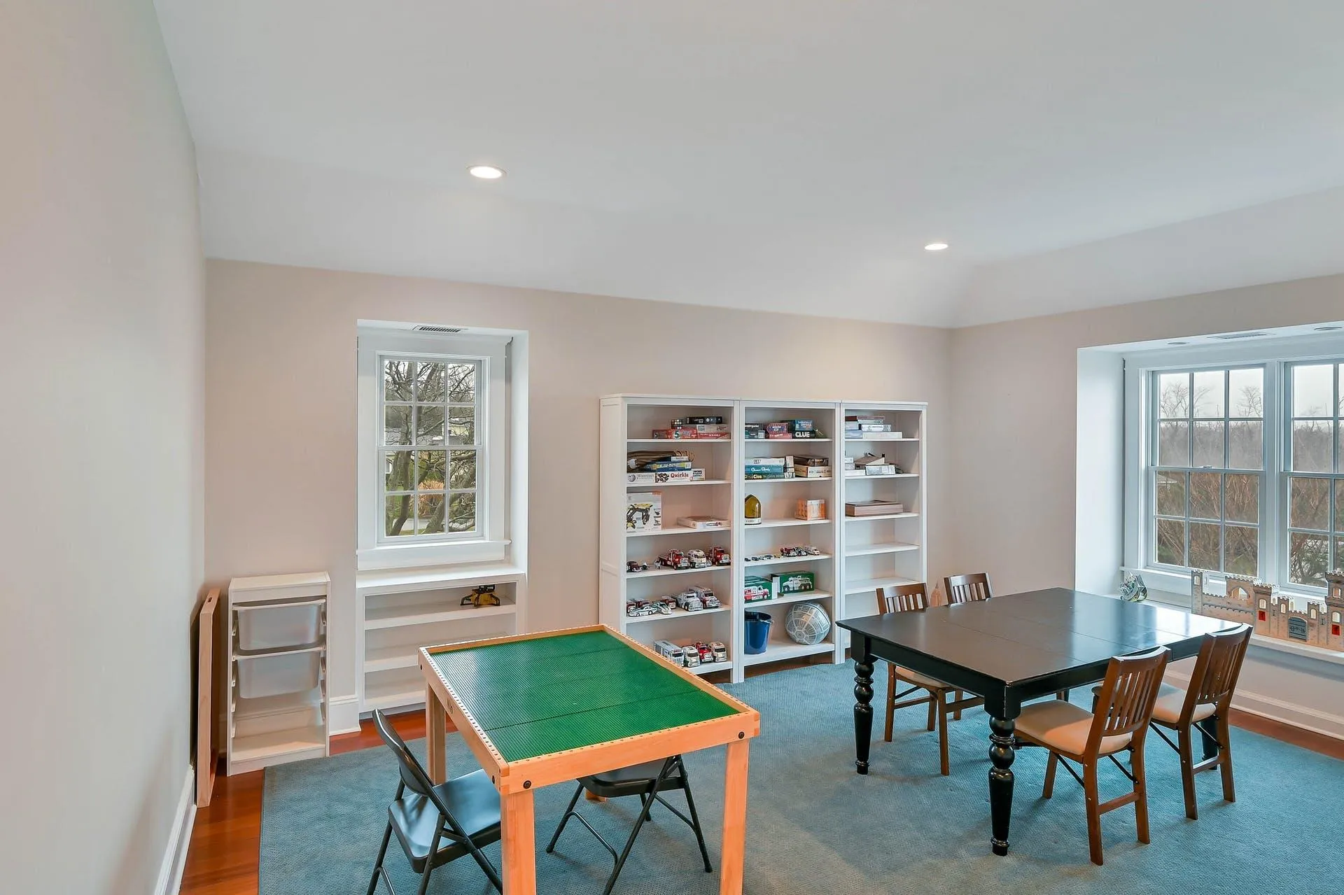 Dining space featuring dark wood-type flooring Dining space featuring dark wood-type flooring