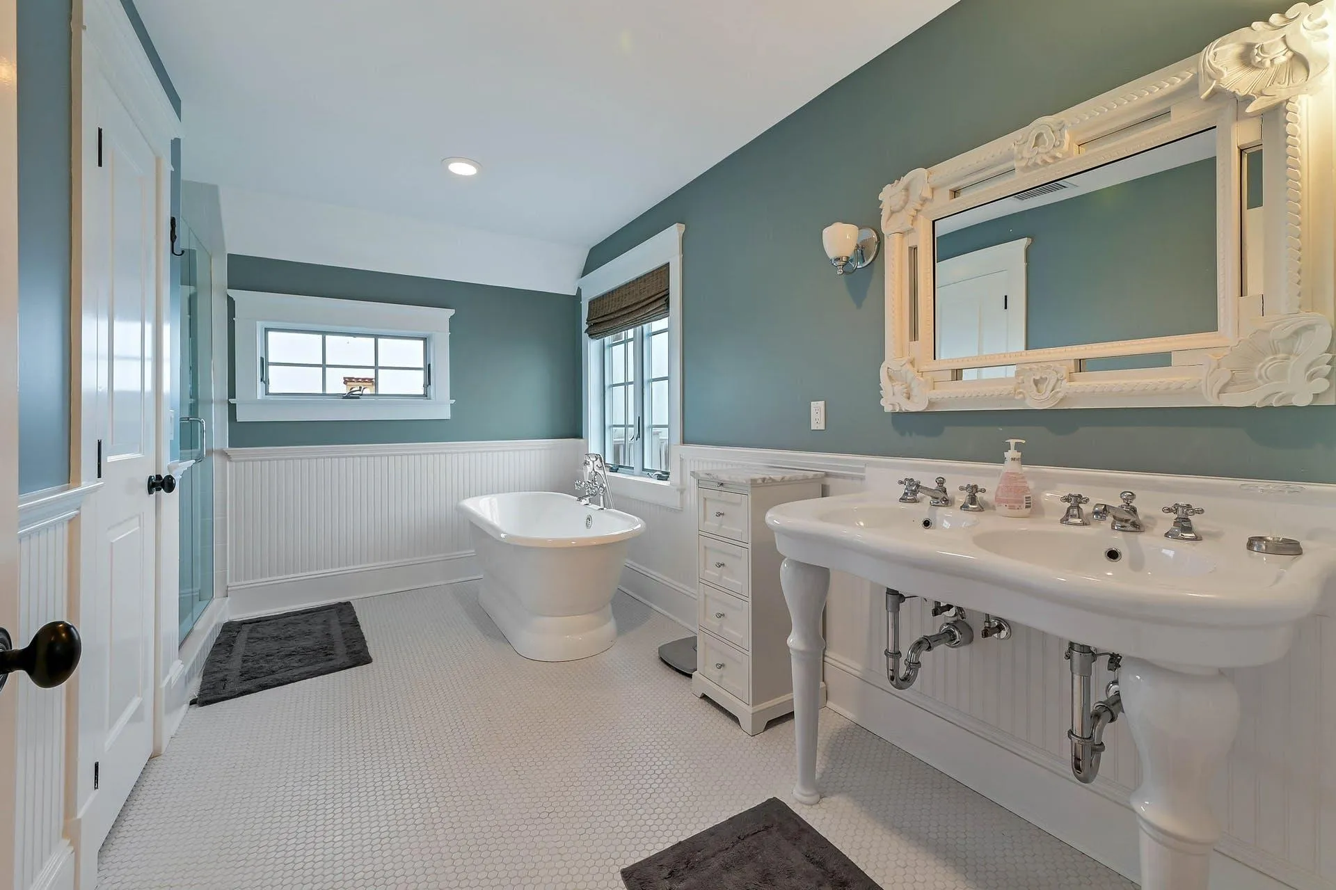 Bathroom with tile patterned floors and plus walk in shower Bathroom with tile patterned floors and plus walk in shower