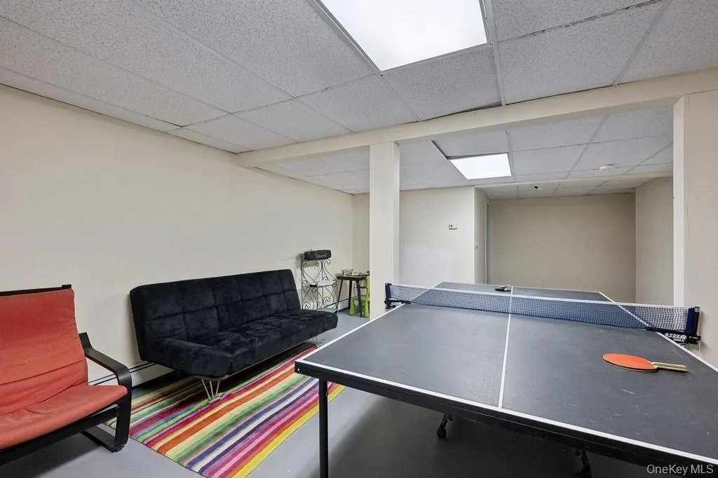 Rec room with a drop ceiling Rec room with a drop ceiling