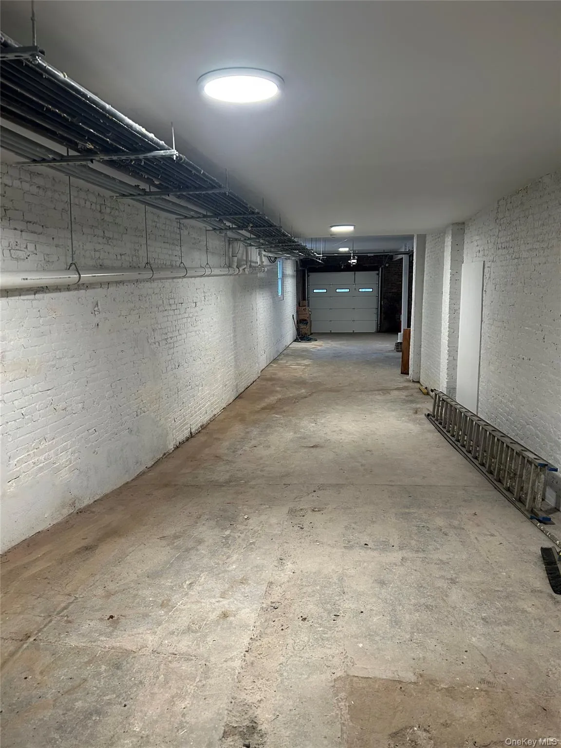 View of space with overhead door View of space with overhead door