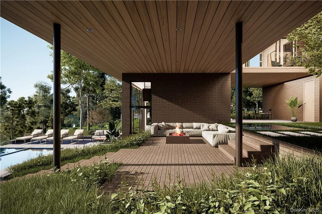 View of patio / terrace featuring a covered outdoor living space. View of patio / terrace featuring a covered outdoor living space.