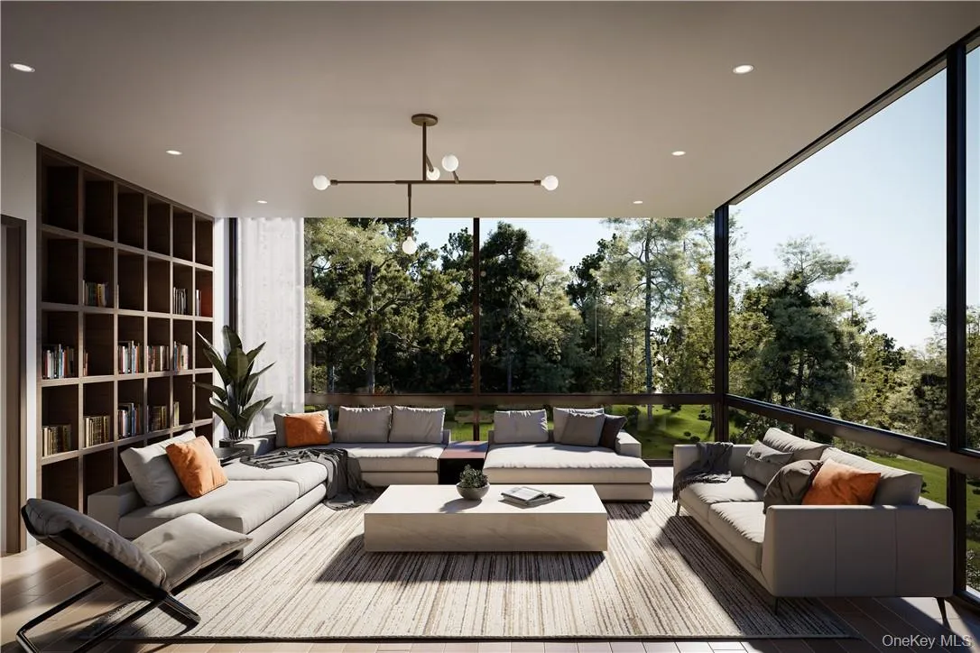 Living room wrapped in efficient triple-pane glass, with the feeling of floating above the landscape. Living room wrapped in efficient triple-pane glass, with the feeling of floating above the landscape.