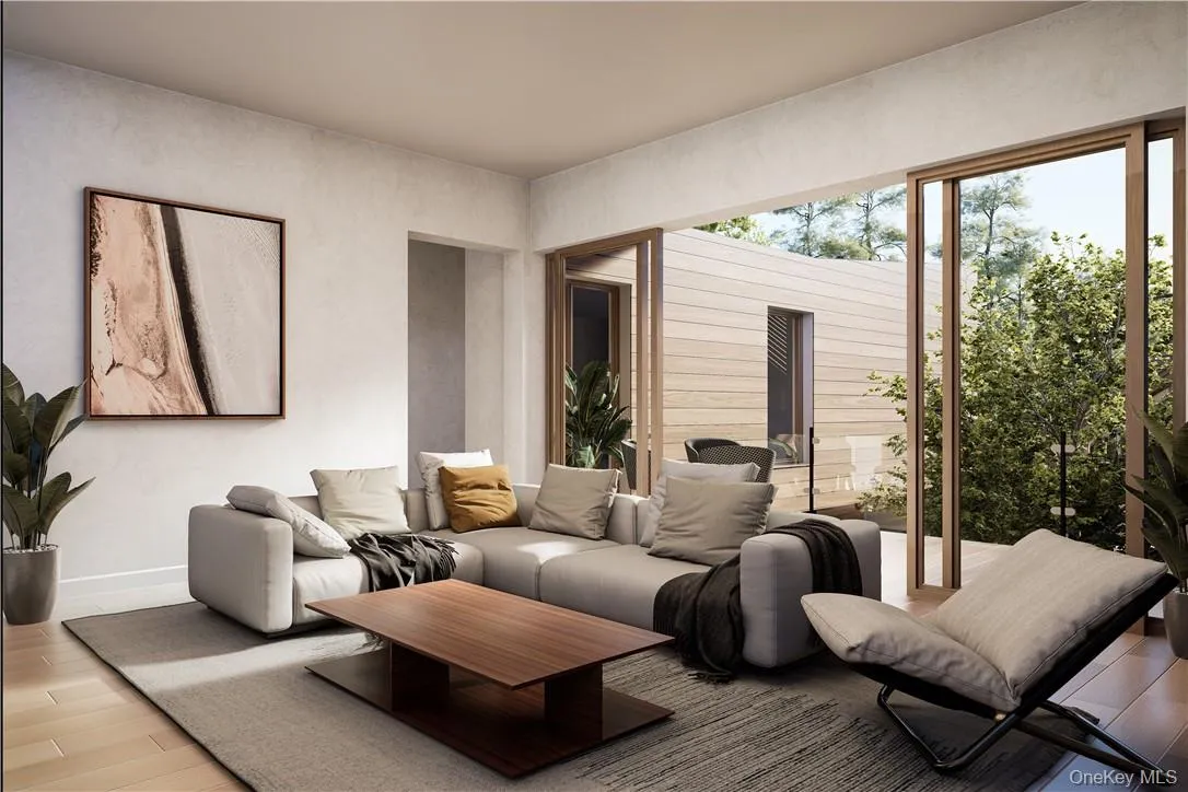 Family room with access to an upper terrace. Family room with access to an upper terrace.