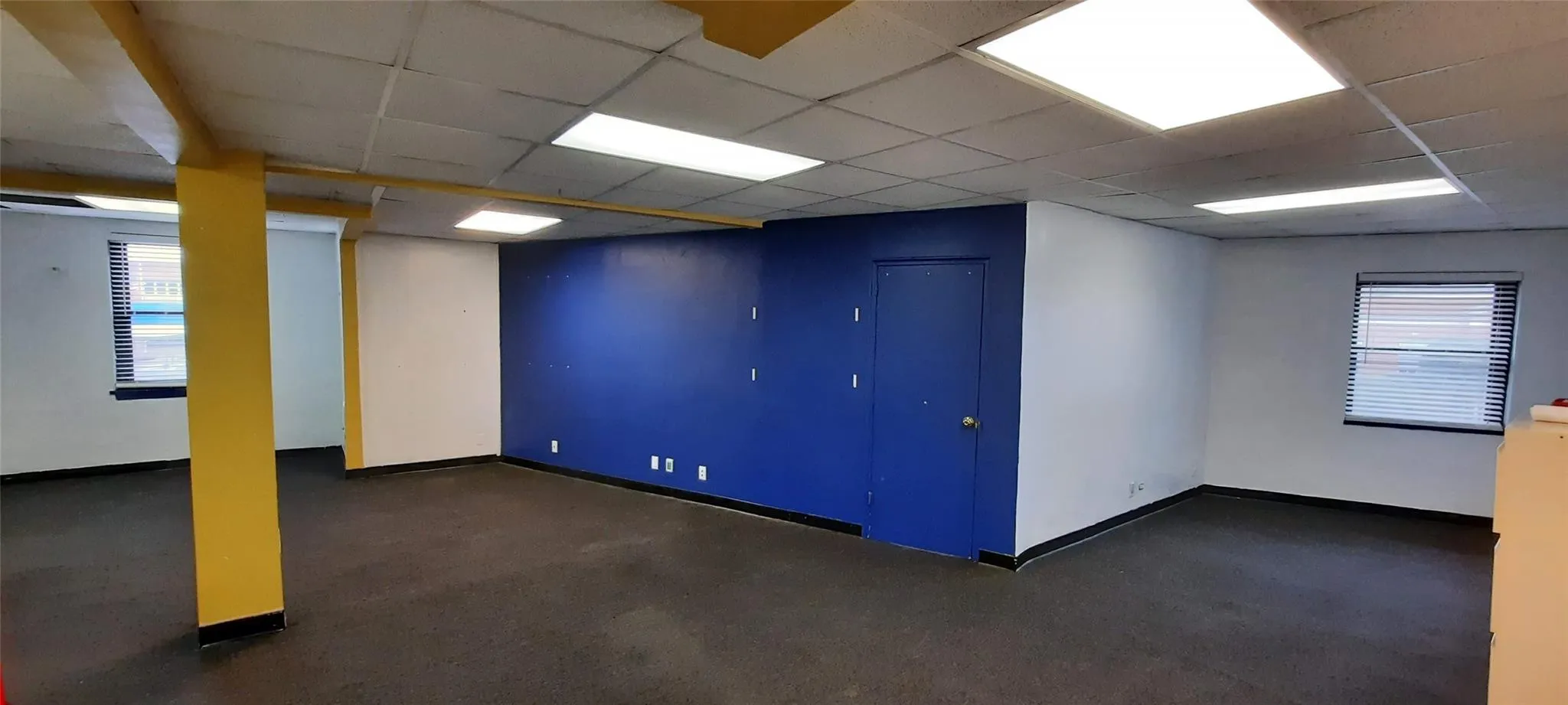 Unfurnished room featuring a paneled ceiling Unfurnished room featuring a paneled ceiling