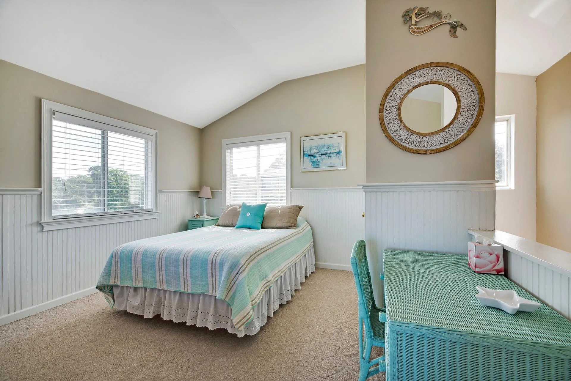 Carpeted bedroom with lofted ceiling Carpeted bedroom with lofted ceiling