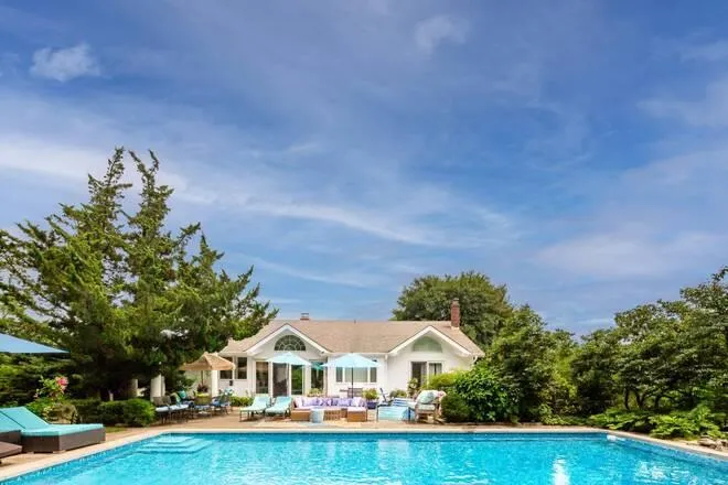 View of pool featuring outdoor lounge area View of pool featuring outdoor lounge area