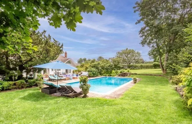 View of swimming pool with a yard View of swimming pool with a yard