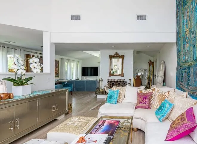 Living room featuring light hardwood / wood-style flooring Living room featuring light hardwood / wood-style flooring