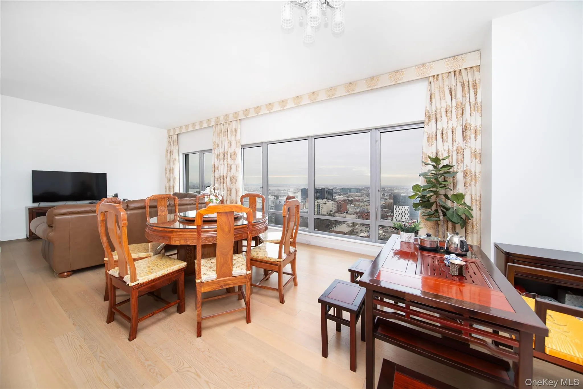 Dining area with light hardwood / wood-style floors Dining area with light hardwood / wood-style floors