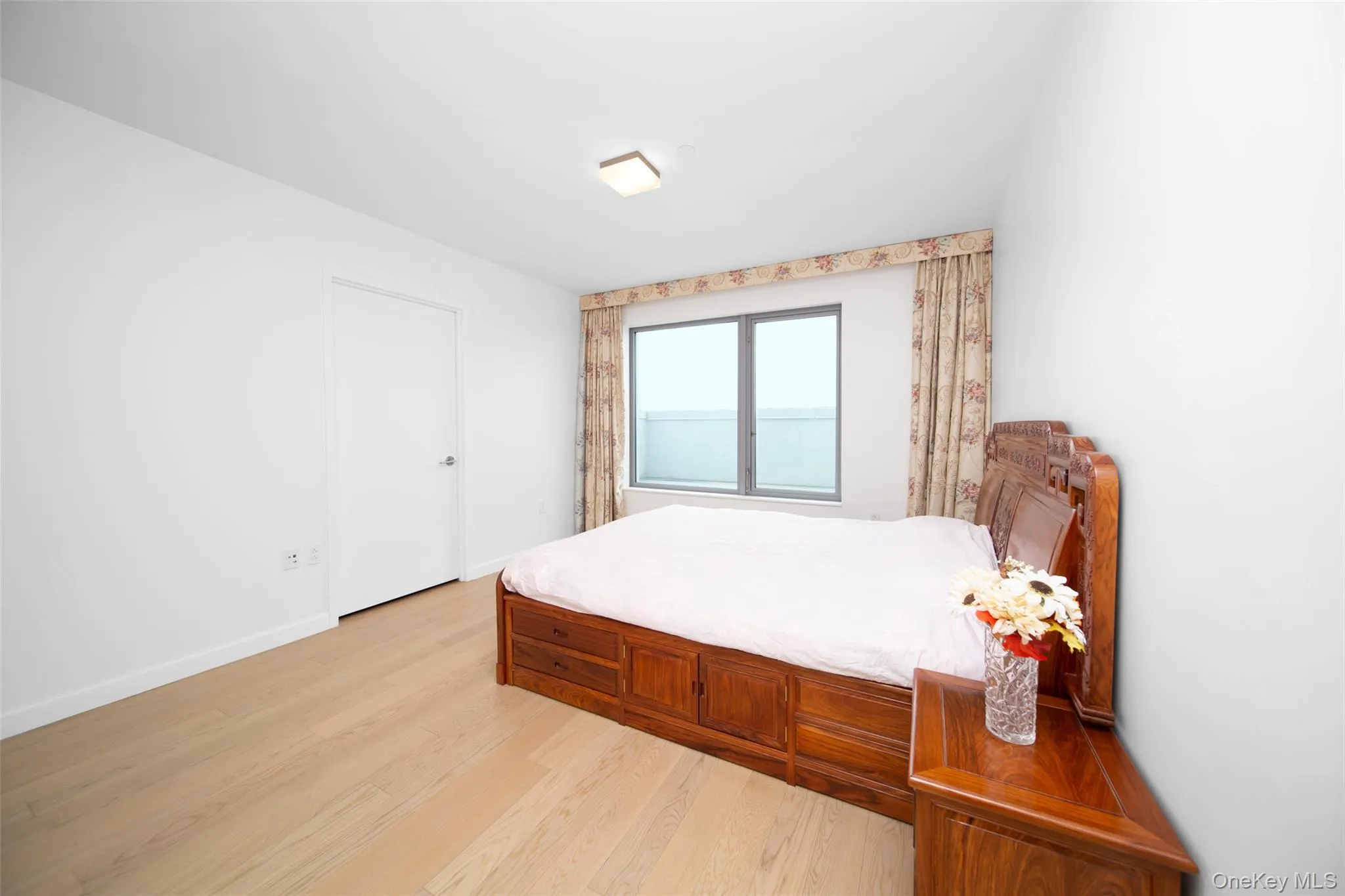 Bedroom featuring light hardwood / wood-style floors Bedroom featuring light hardwood / wood-style floors