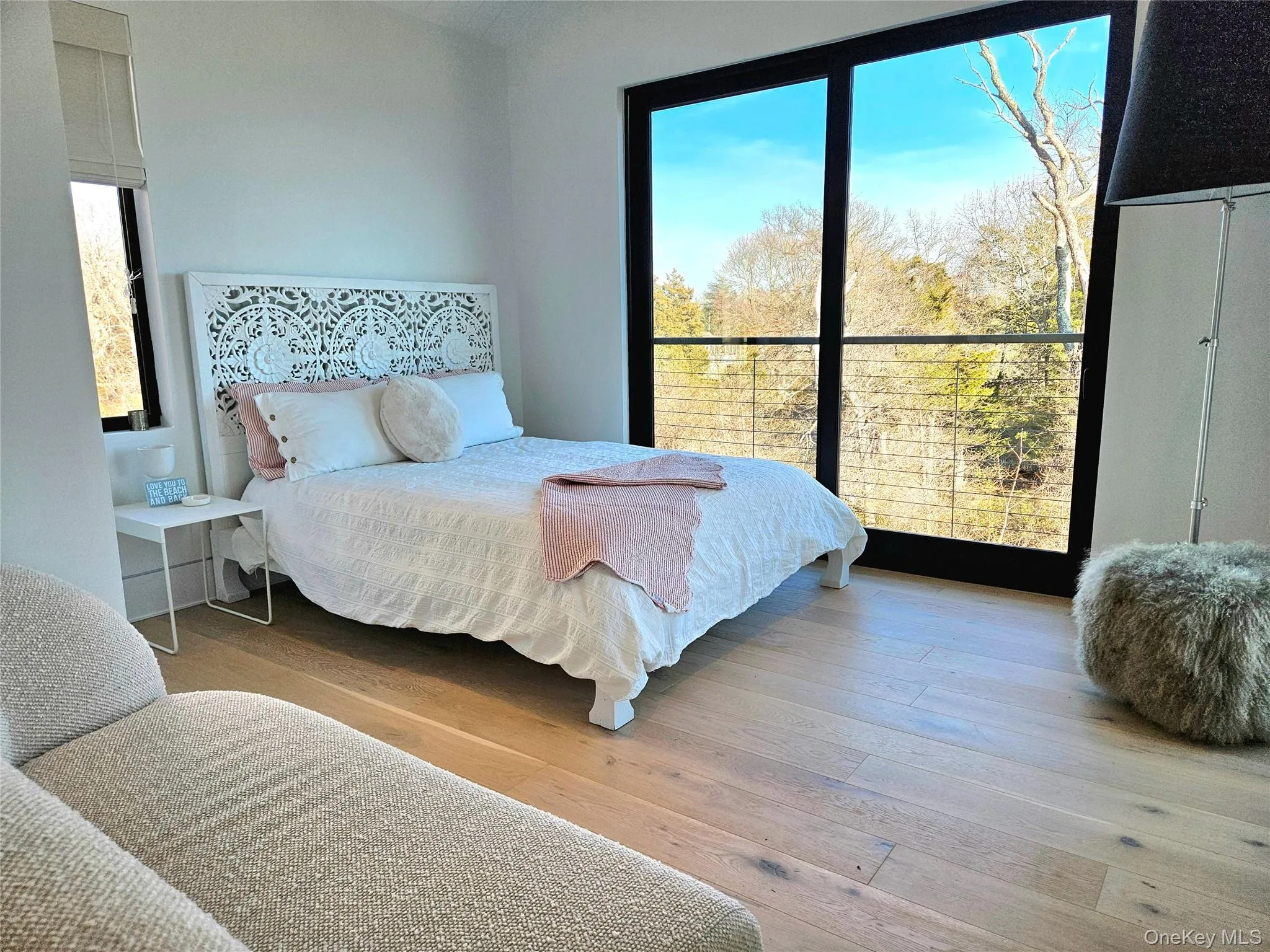 Bedroom featuring wood-type flooring Bedroom featuring wood-type flooring