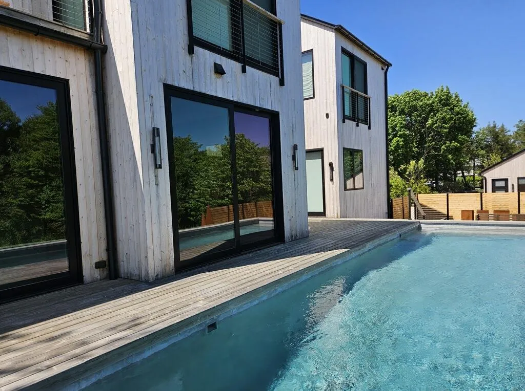 View of swimming pool with a deck and a fenced in pool View of swimming pool with a deck and a fenced in pool