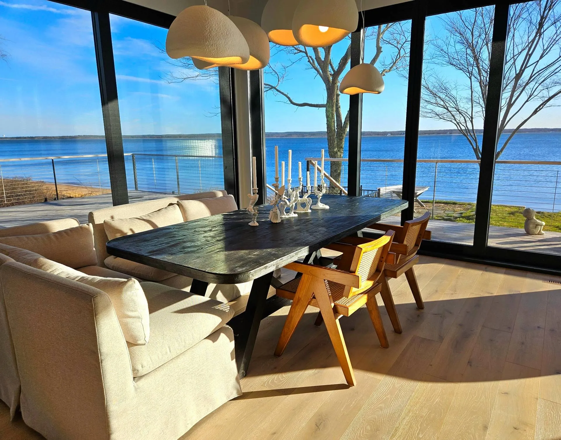 Sunroom featuring a water view Sunroom featuring a water view