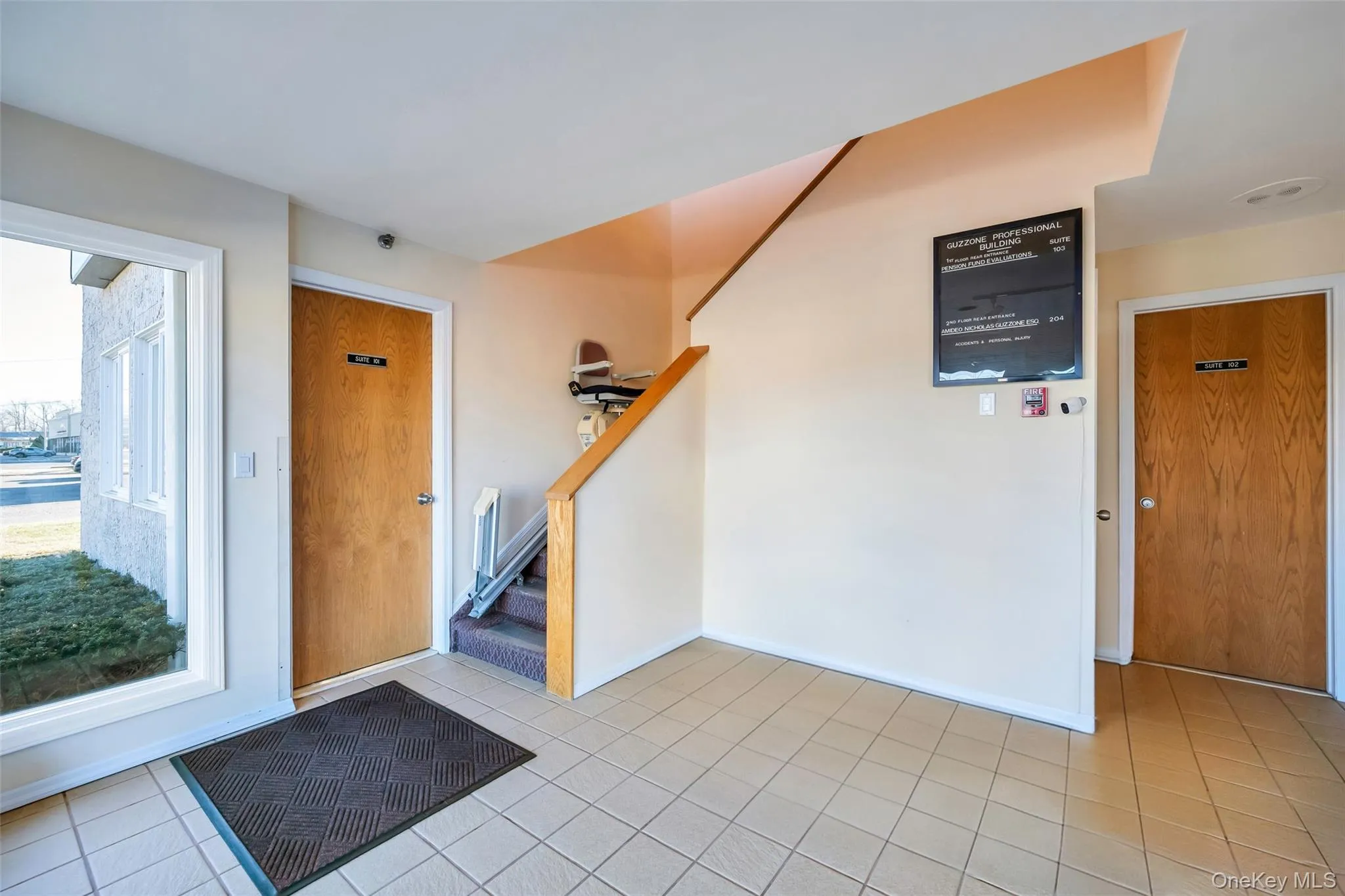 Tiled entryway with plenty of natural light Tiled entryway with plenty of natural light