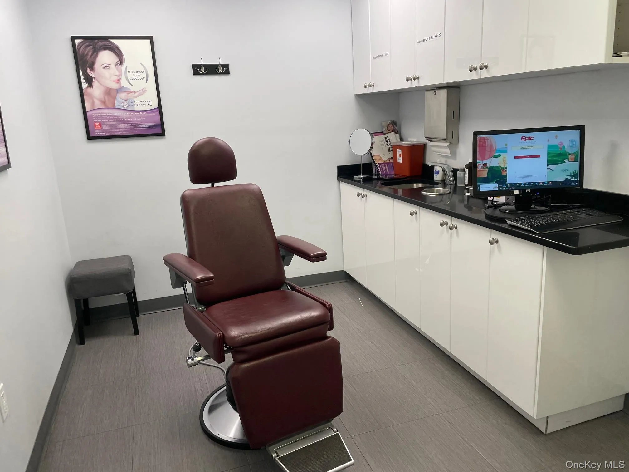 Kitchen featuring white cabinets and sink Kitchen featuring white cabinets and sink