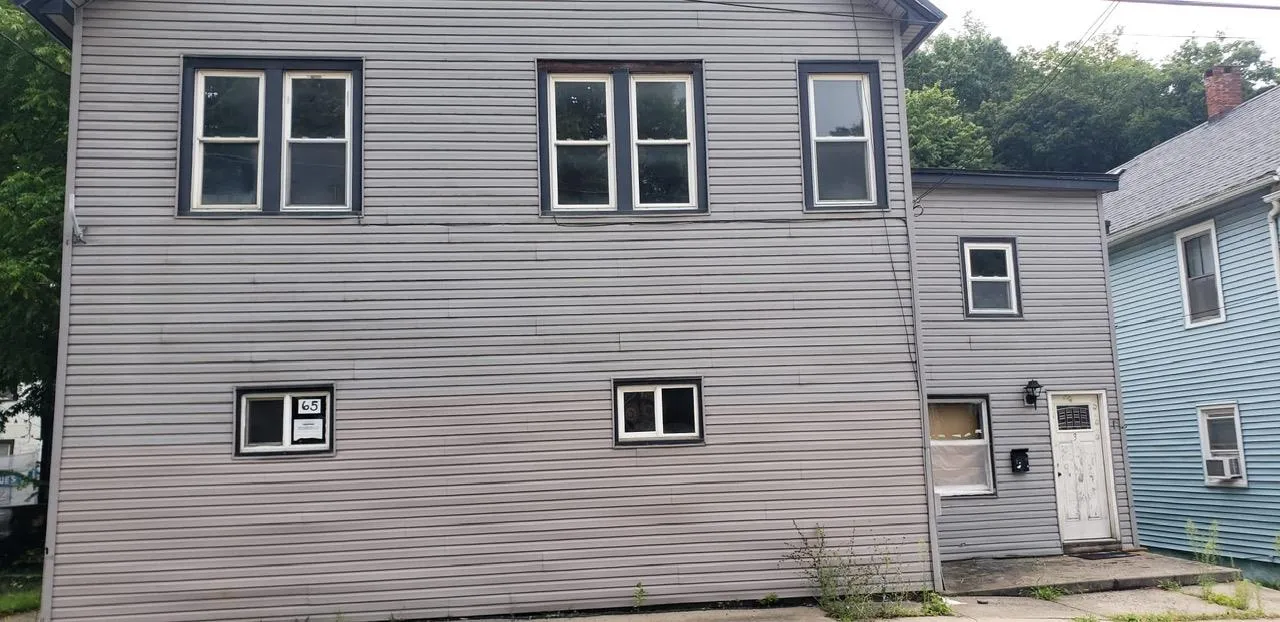 View of side of property with cooling unit View of side of property with cooling unit