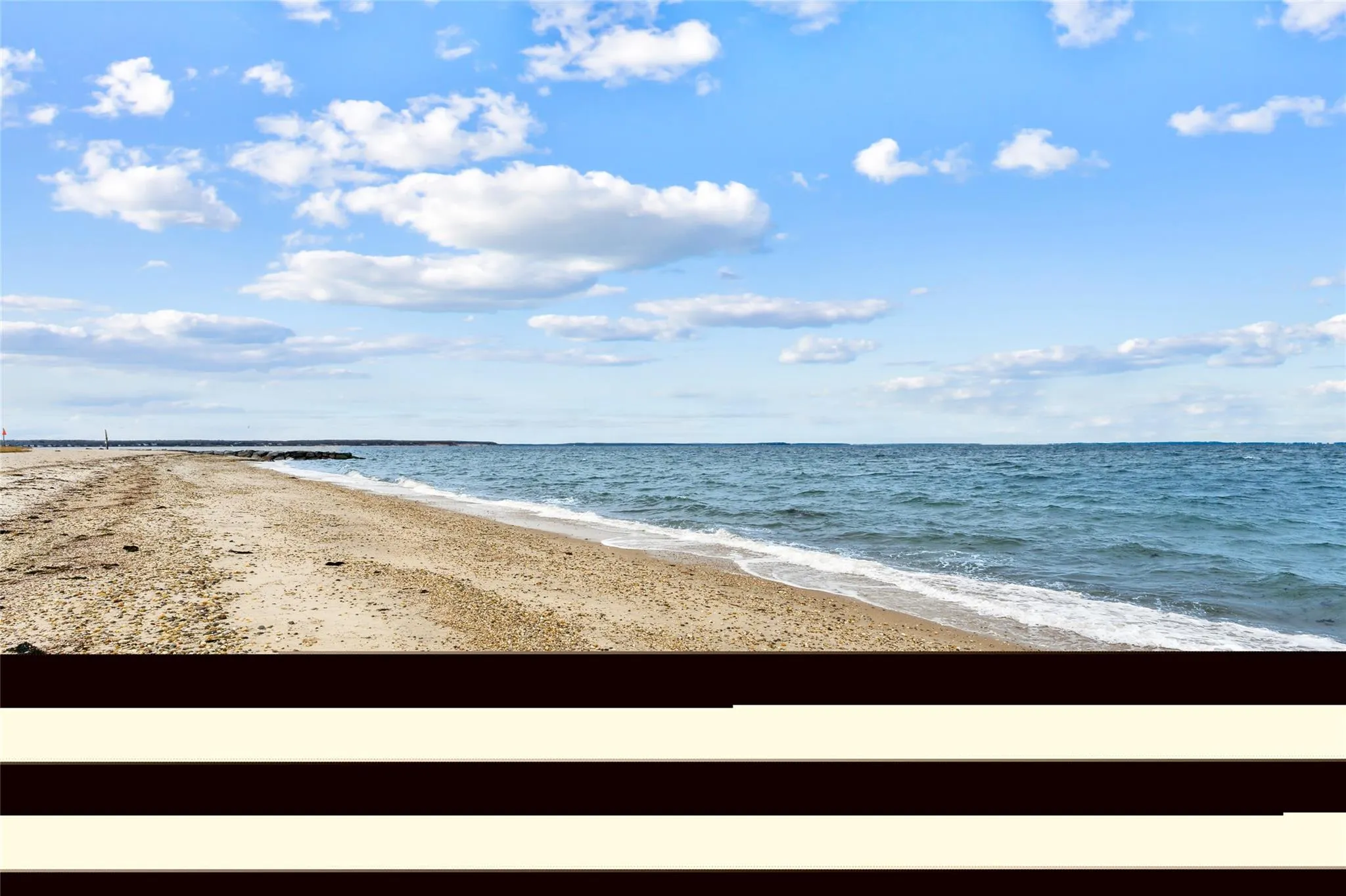 Water view with a view of the beach Water view with a view of the beach