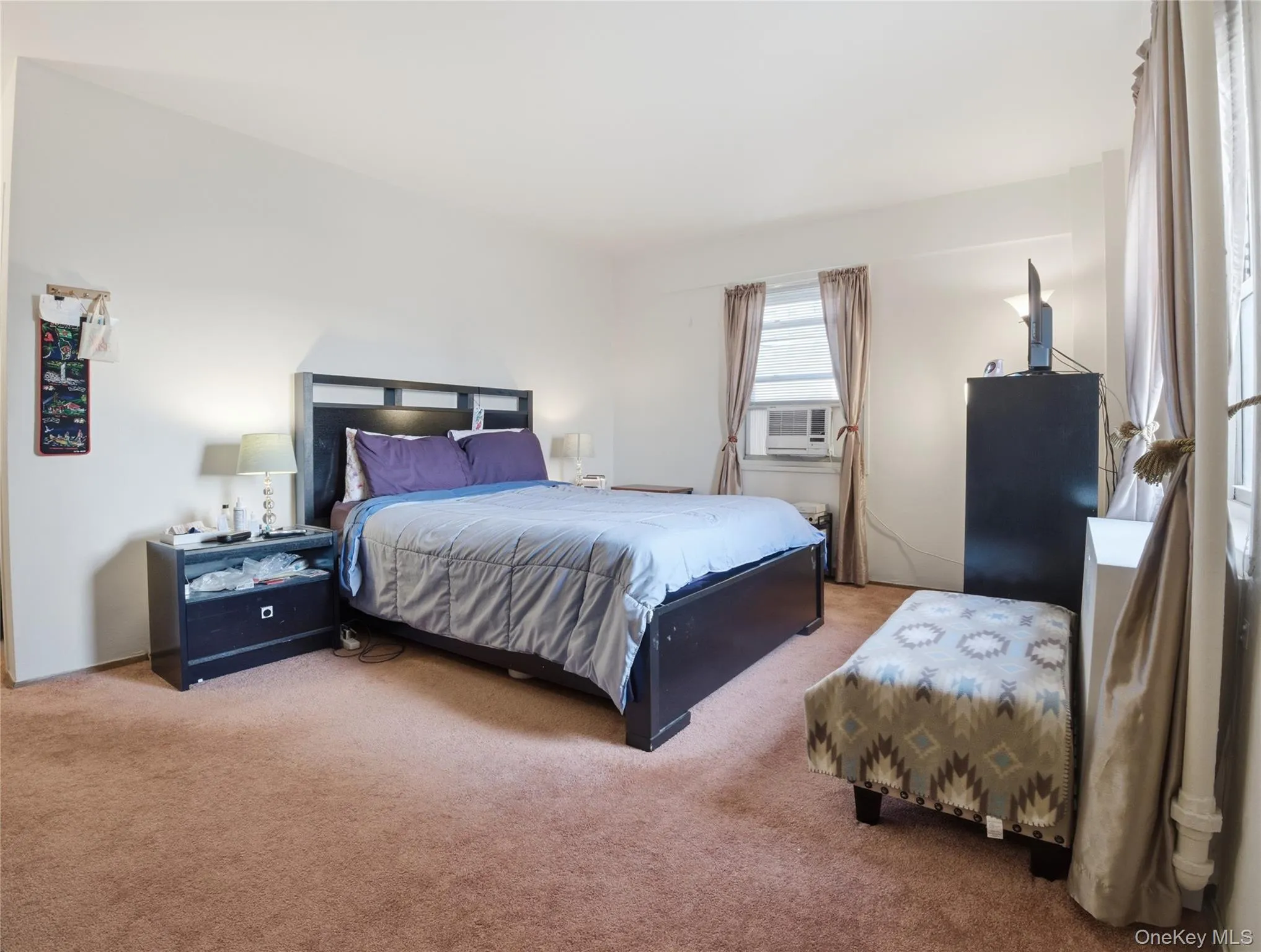 Bedroom with carpet flooring Bedroom with carpet flooring