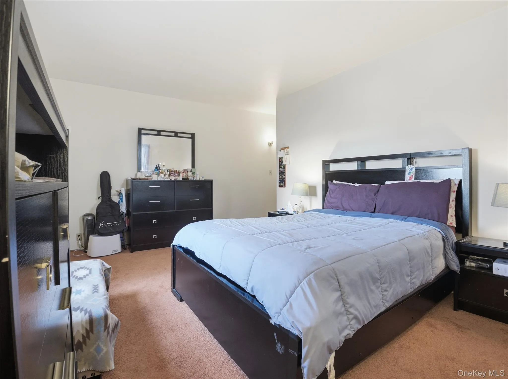 Bedroom with carpet floors Bedroom with carpet floors
