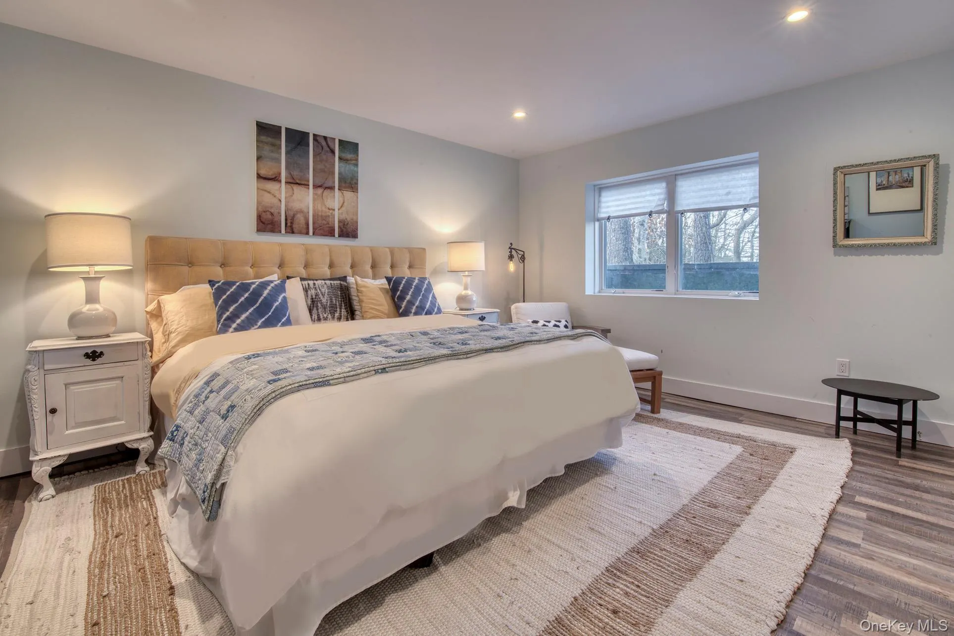 Bedroom with recessed lighting, baseboards, and wood finished floors Bedroom with recessed lighting, baseboards, and wood finished floors