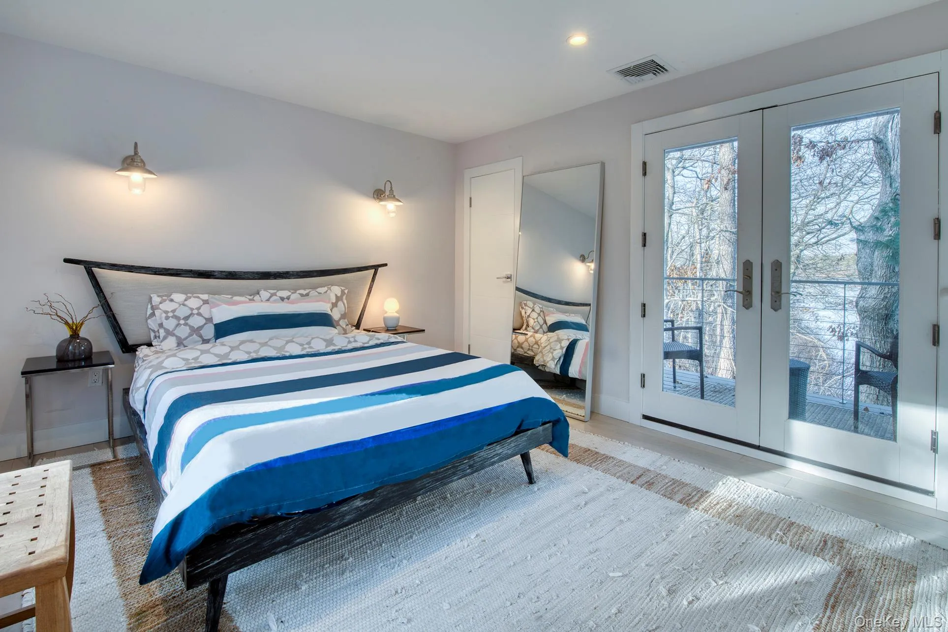 Bedroom featuring french doors, visible vents, and access to exterior Bedroom featuring french doors, visible vents, and access to exterior
