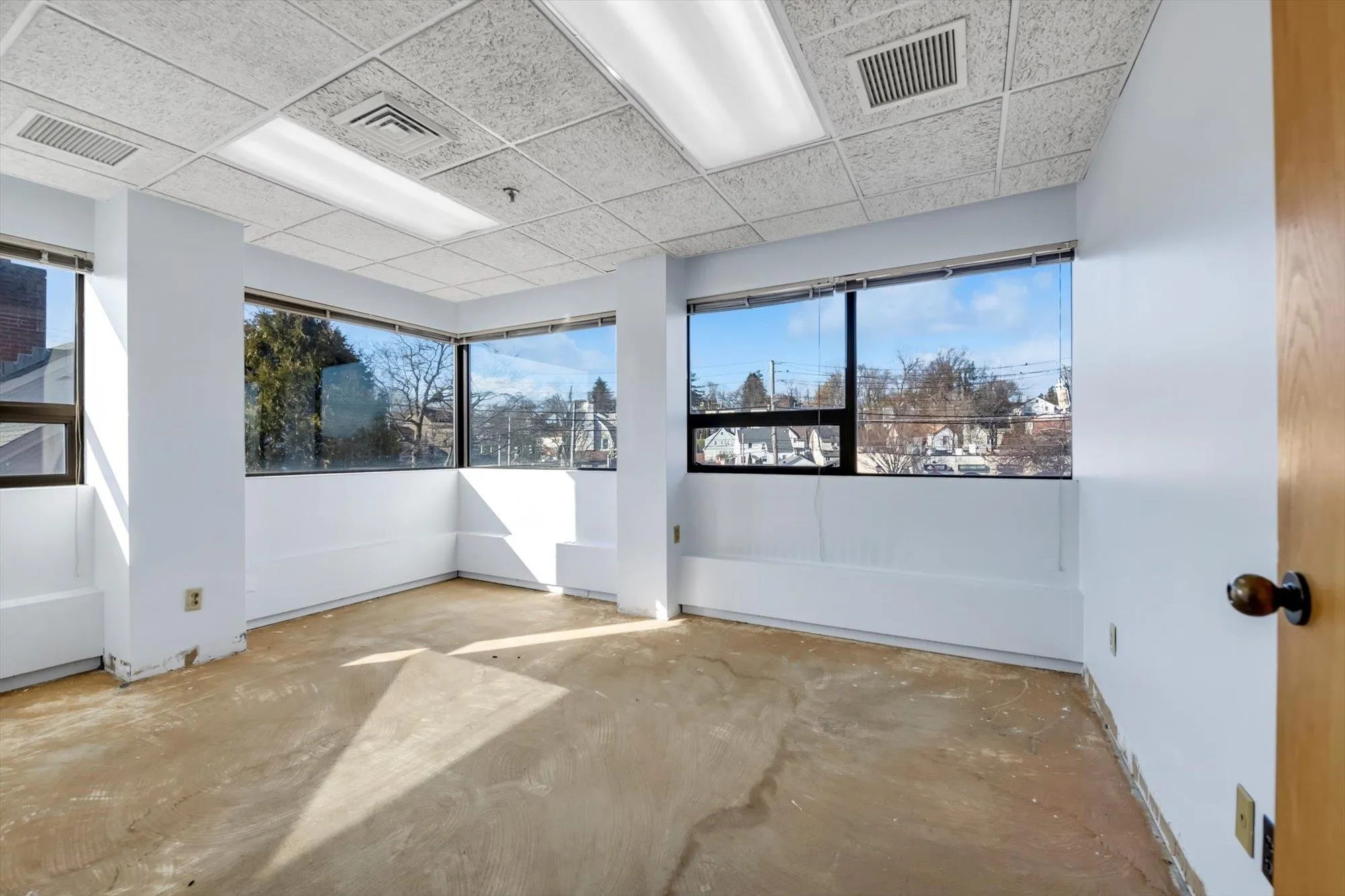 Spare room with a drop ceiling Spare room with a drop ceiling