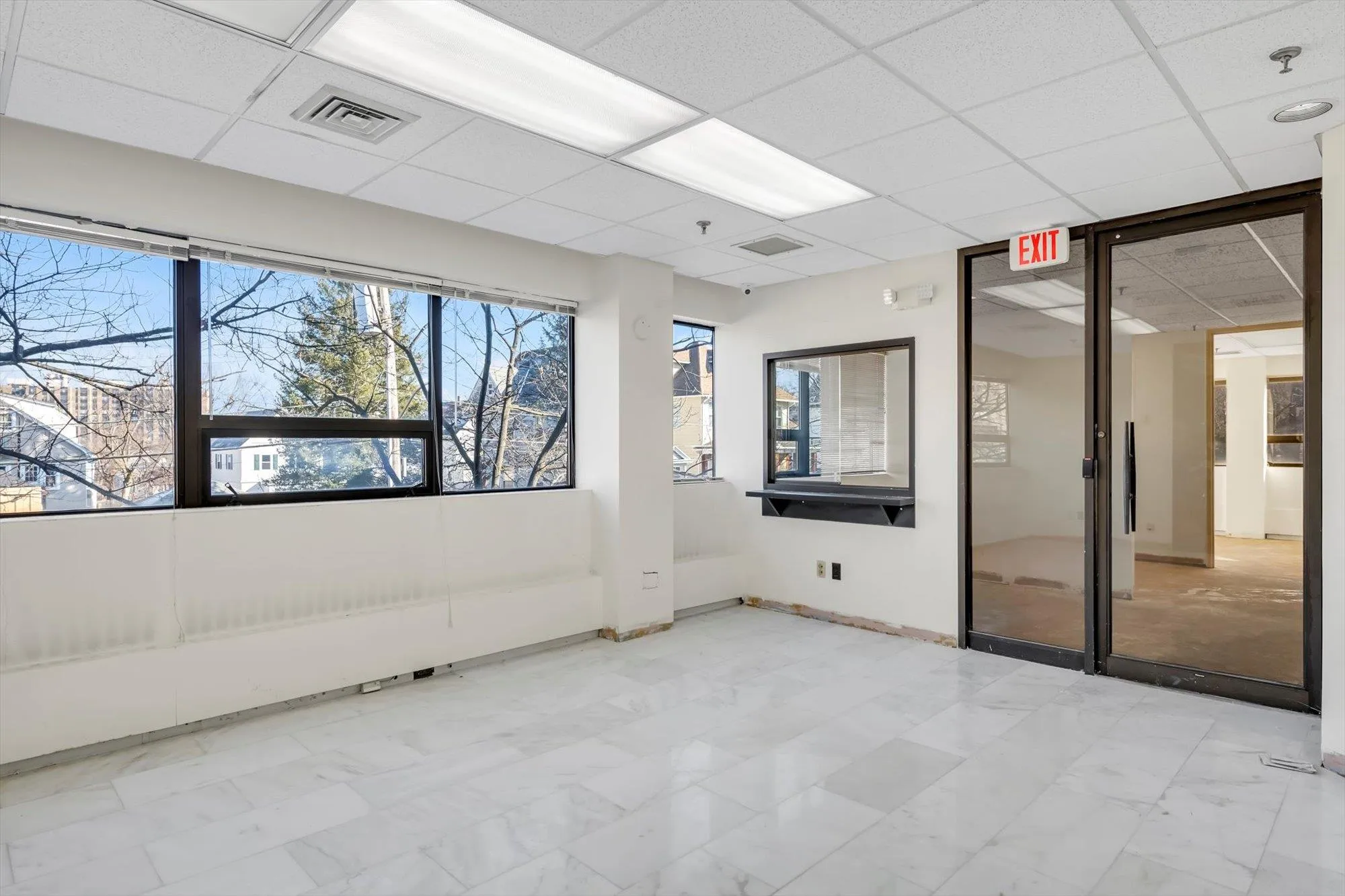 Spare room with a drop ceiling Spare room with a drop ceiling