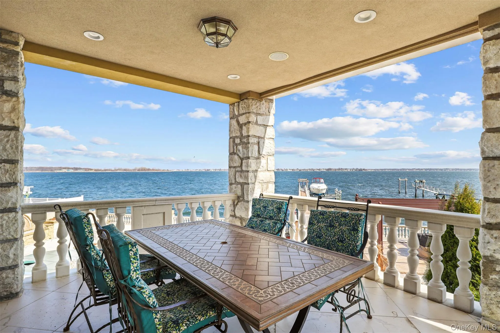 View of patio with a water view View of patio with a water view