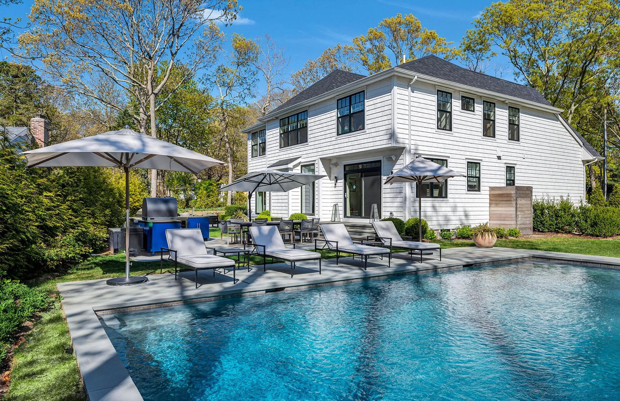 View of pool with a patio and grilling area View of pool with a patio and grilling area