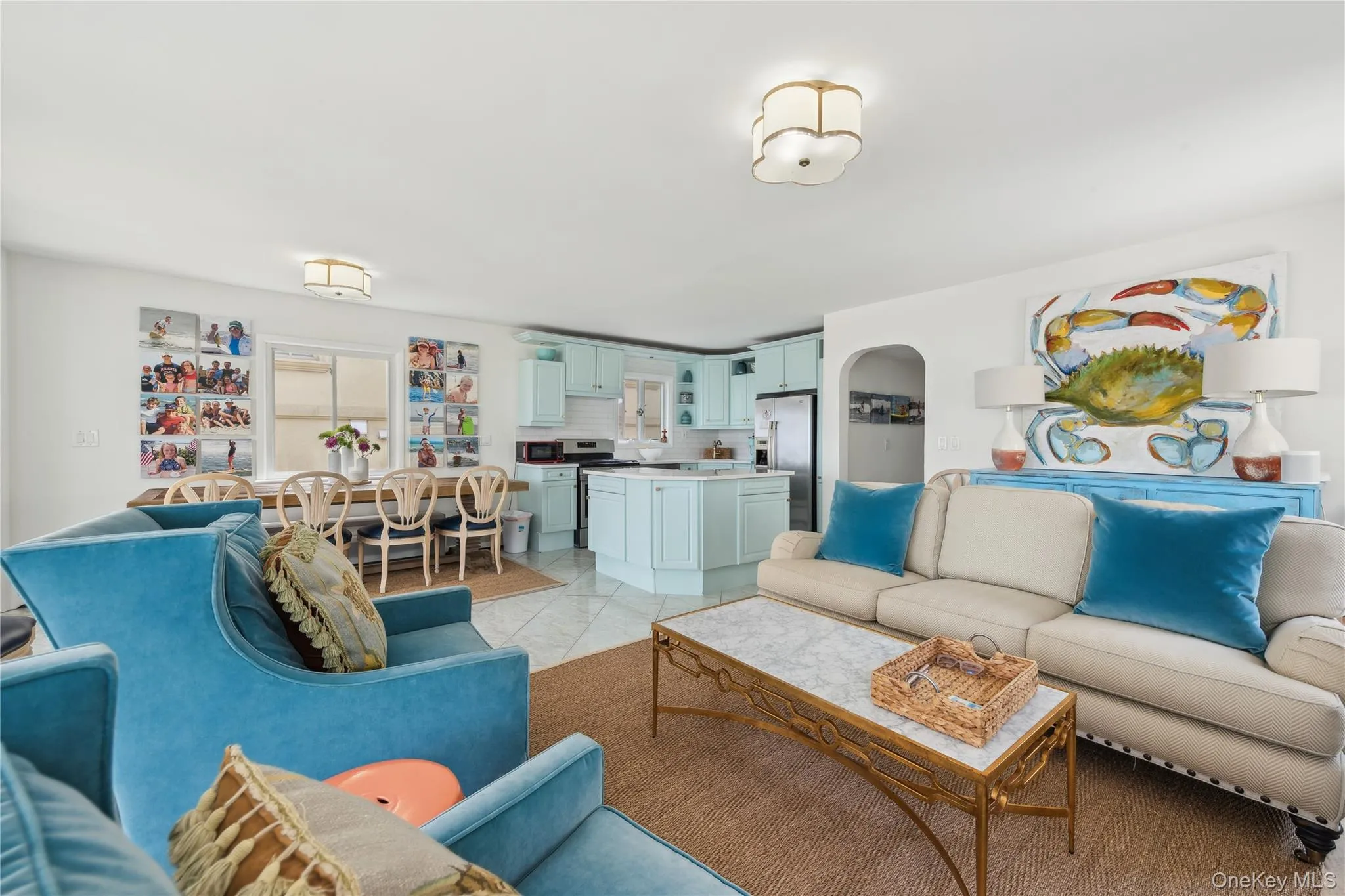 Living room with light tile patterned floors Living room with light tile patterned floors