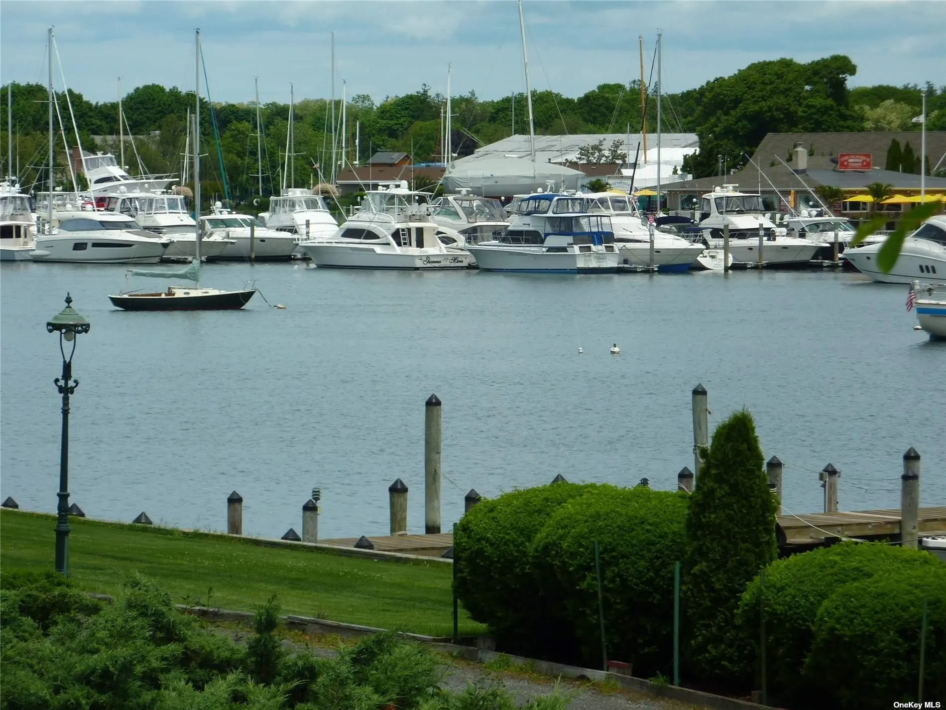 View of water feature with a boat dock View of water feature with a boat dock