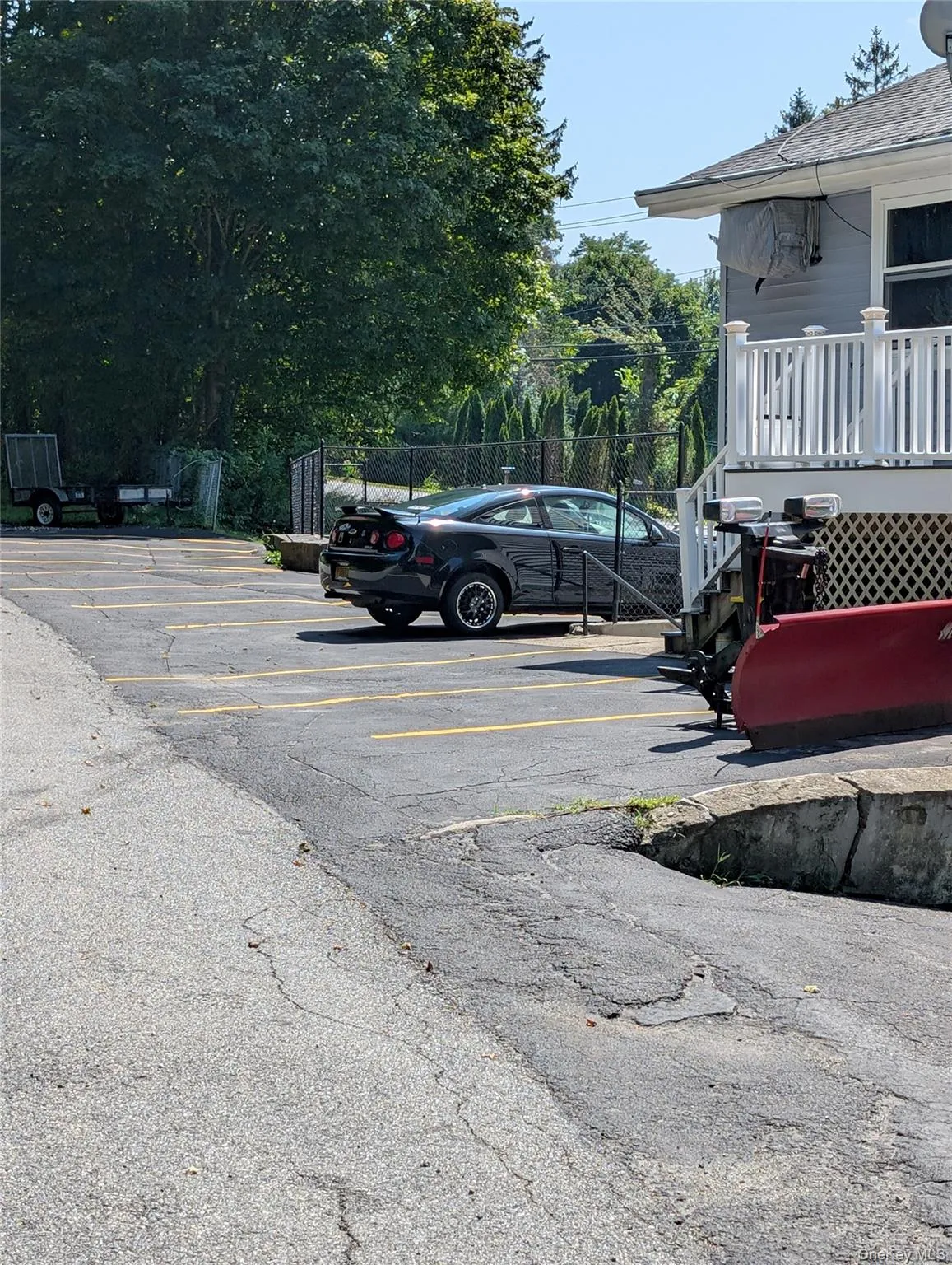 View of apartment side with newly paved and designated parking View of apartment side with newly paved and designated parking