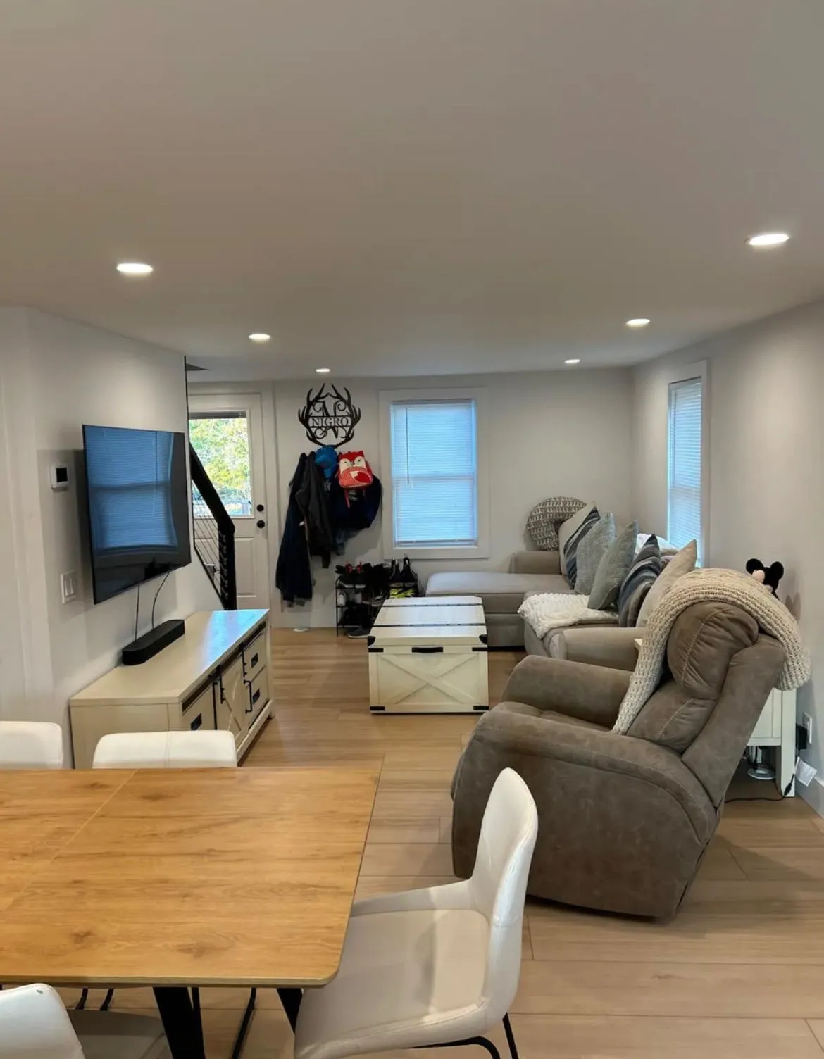 Living room with light wood-type flooring Living room with light wood-type flooring