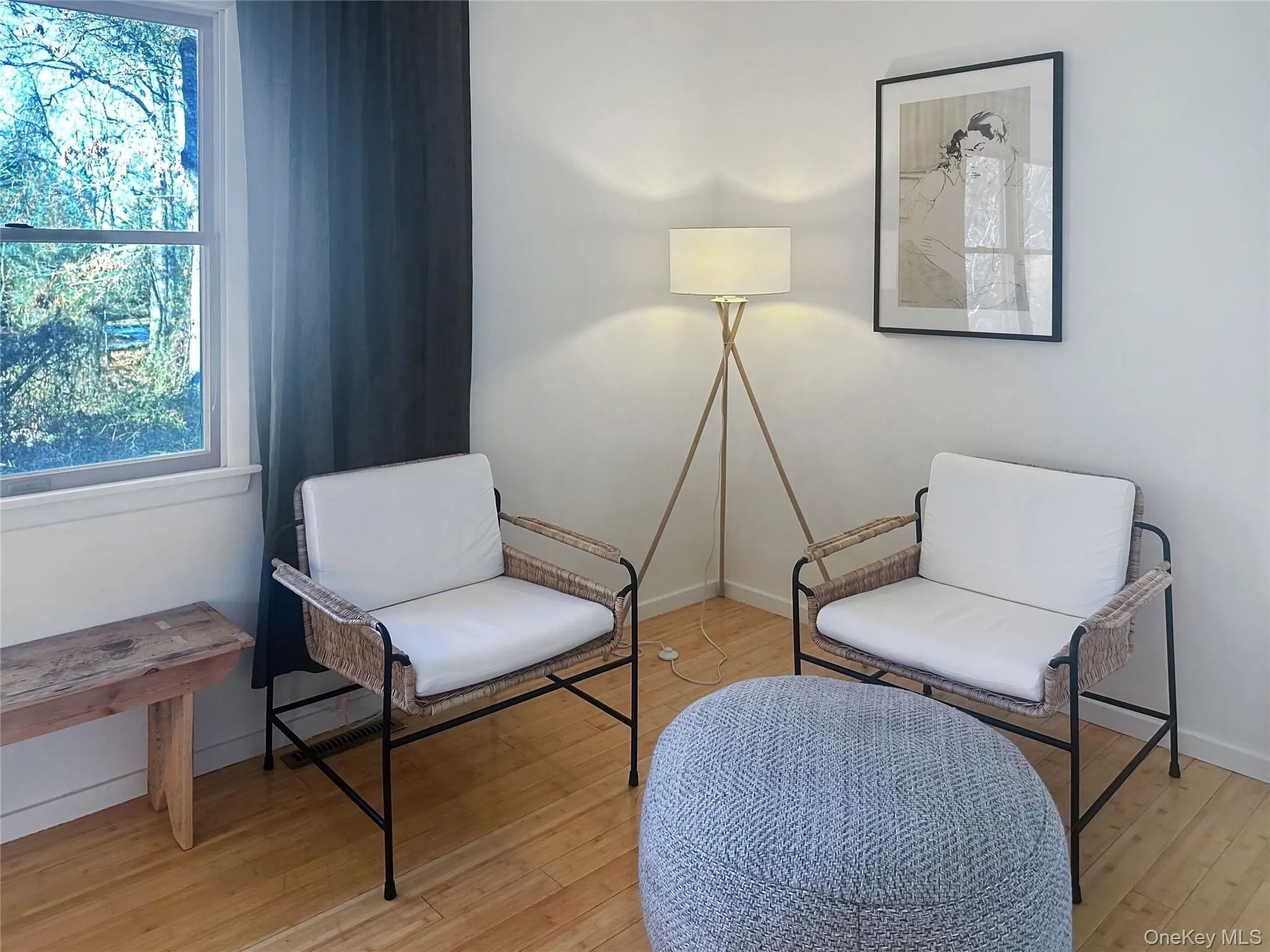 Living area featuring light hardwood / wood-style floors Living area featuring light hardwood / wood-style floors