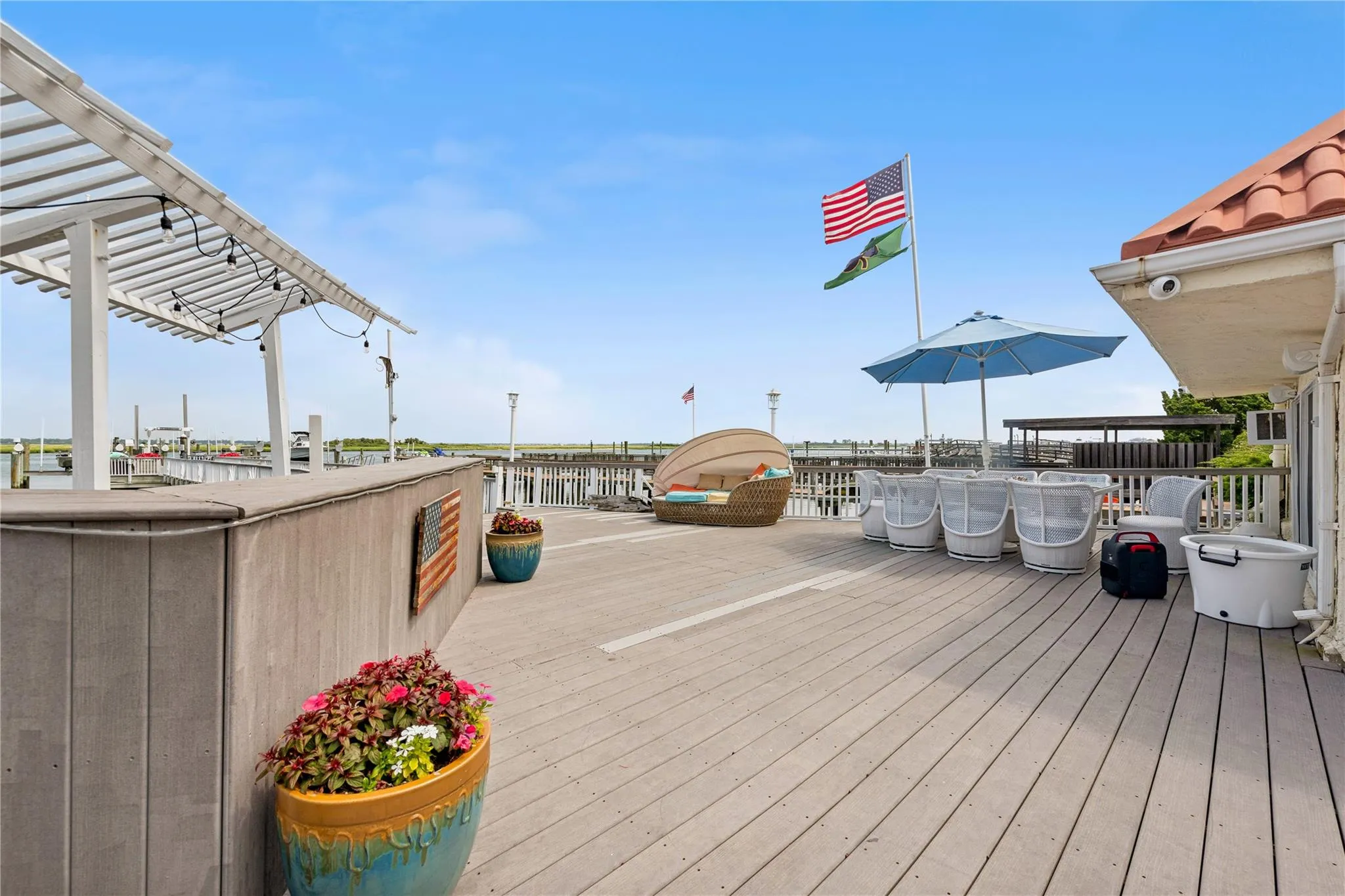 Wooden terrace featuring a pergola Wooden terrace featuring a pergola