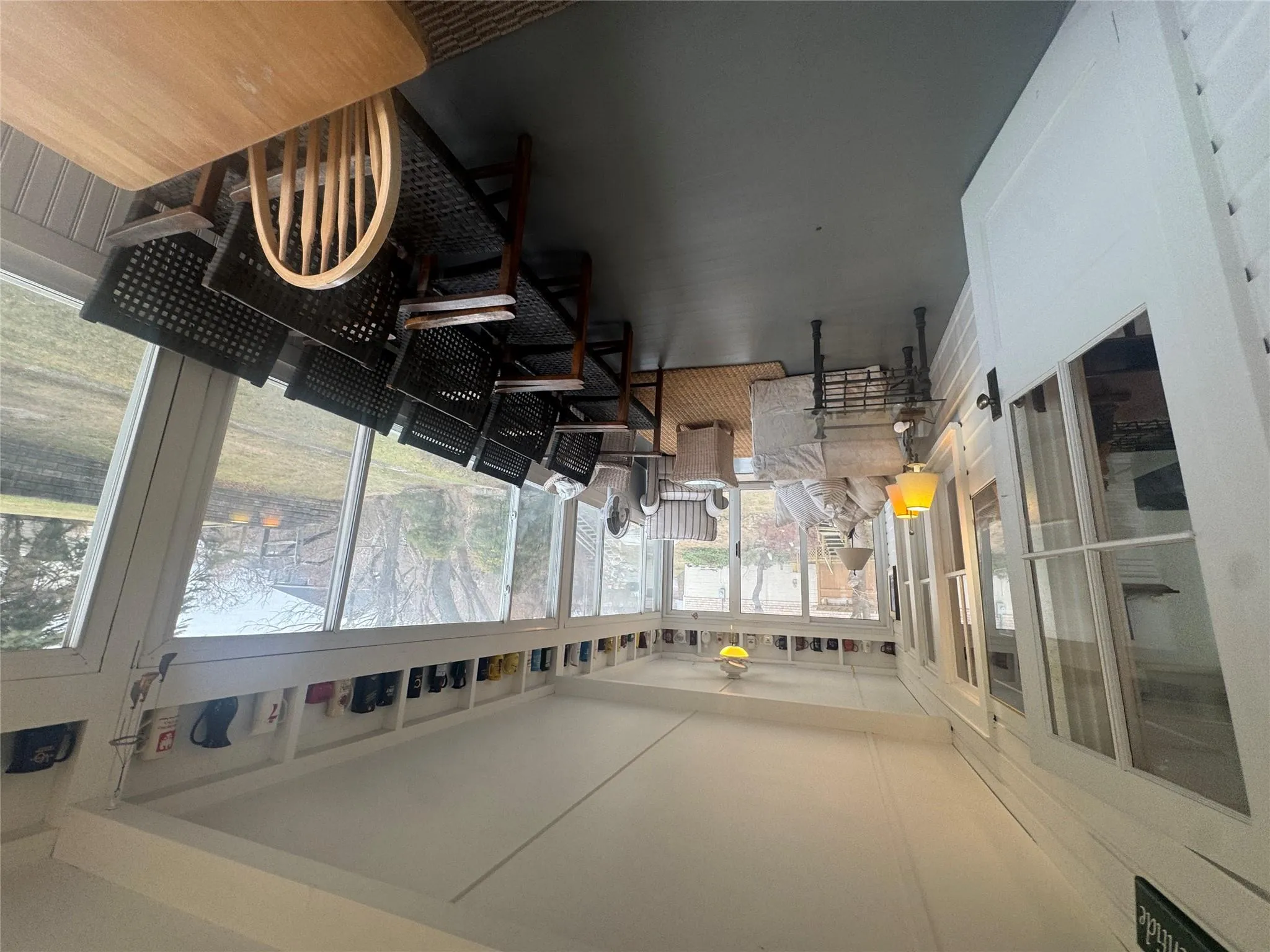 Sunroom featuring ceiling fan Sunroom featuring ceiling fan