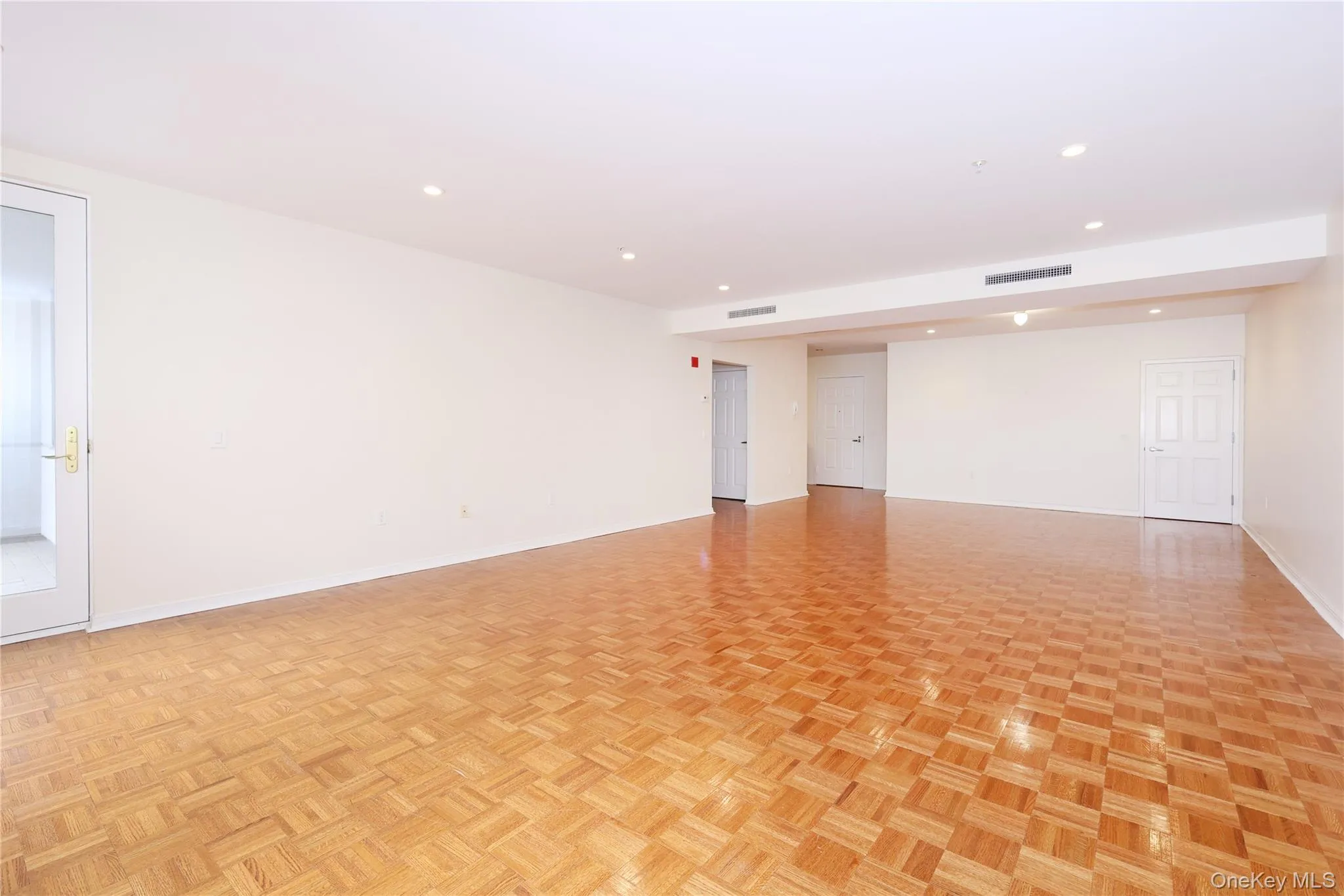 Spare room with recessed lighting and baseboards Spare room with recessed lighting and baseboards
