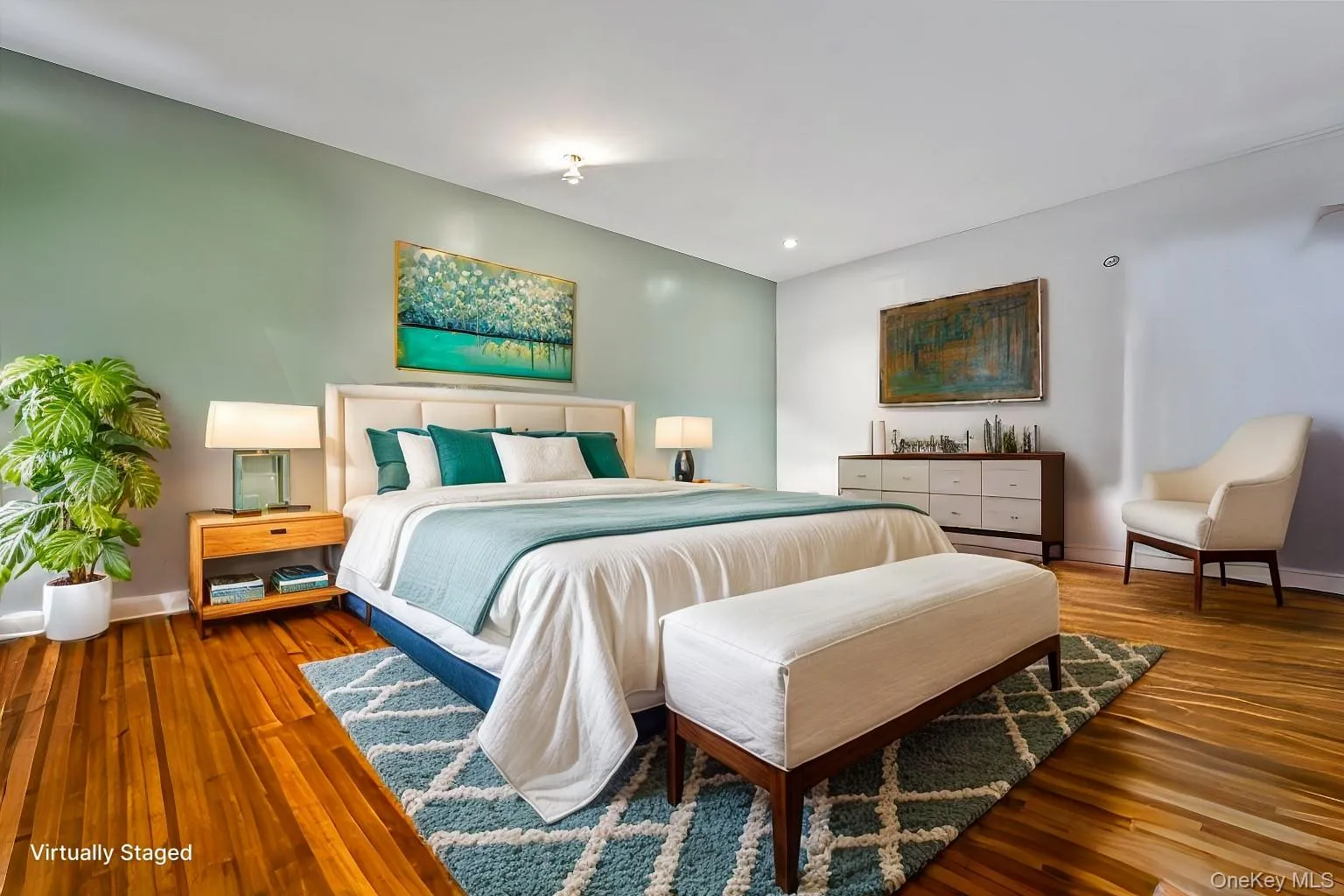 Bedroom with baseboards and hardwood / wood-style floors Bedroom with baseboards and hardwood / wood-style floors